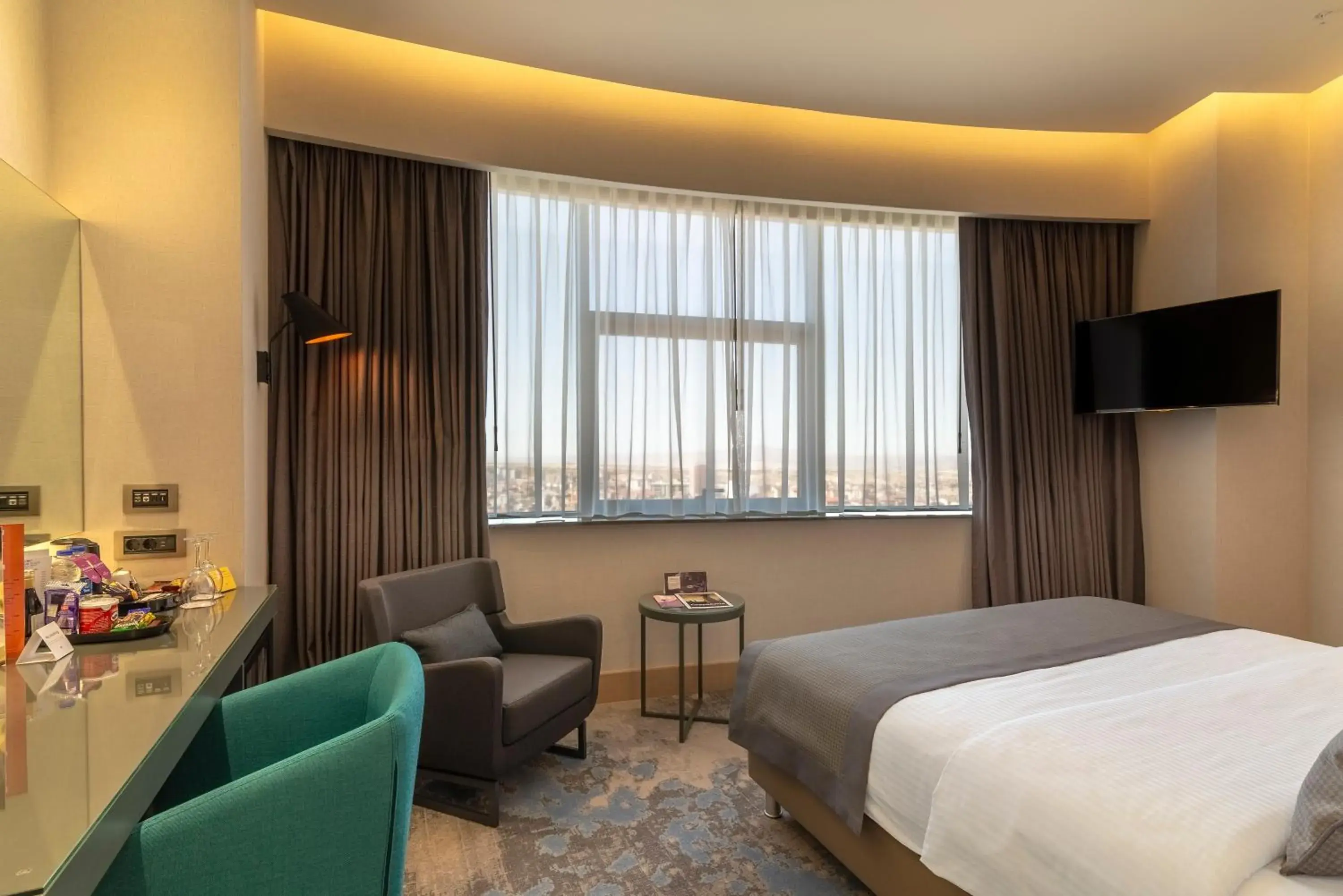 Photo of the whole room, Bed in Crowne Plaza Cappadocia - Nevsehir by IHG Photo of the whole room, Bed in Crowne Plaza Cappadocia - Nevsehir by IHG