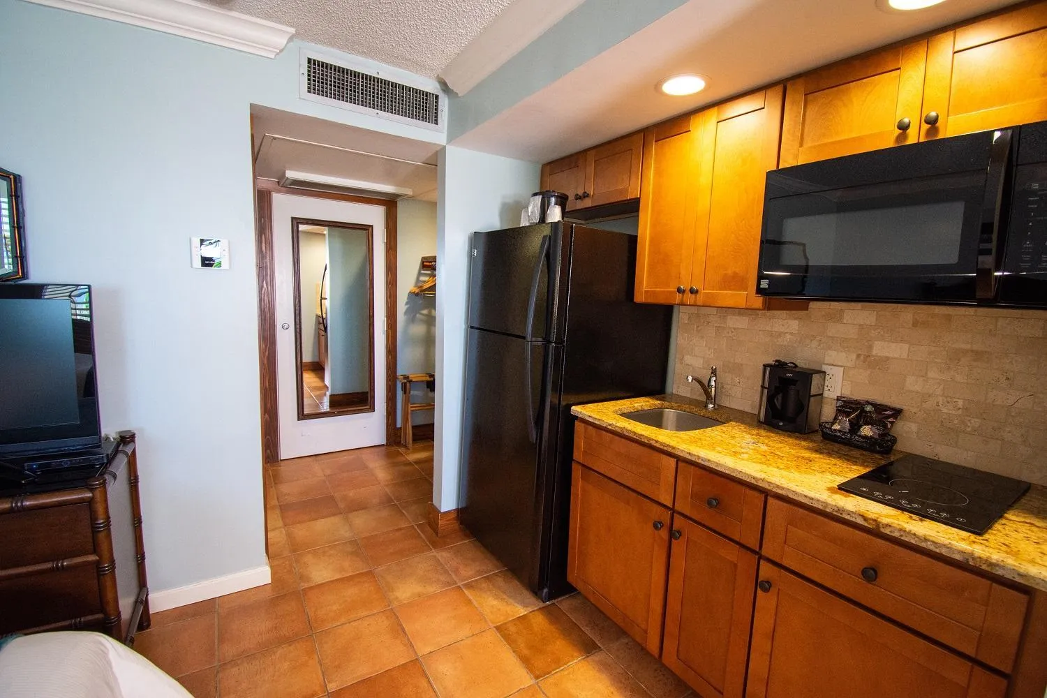 Kitchen or kitchenette in Vanderbilt Beach Resort