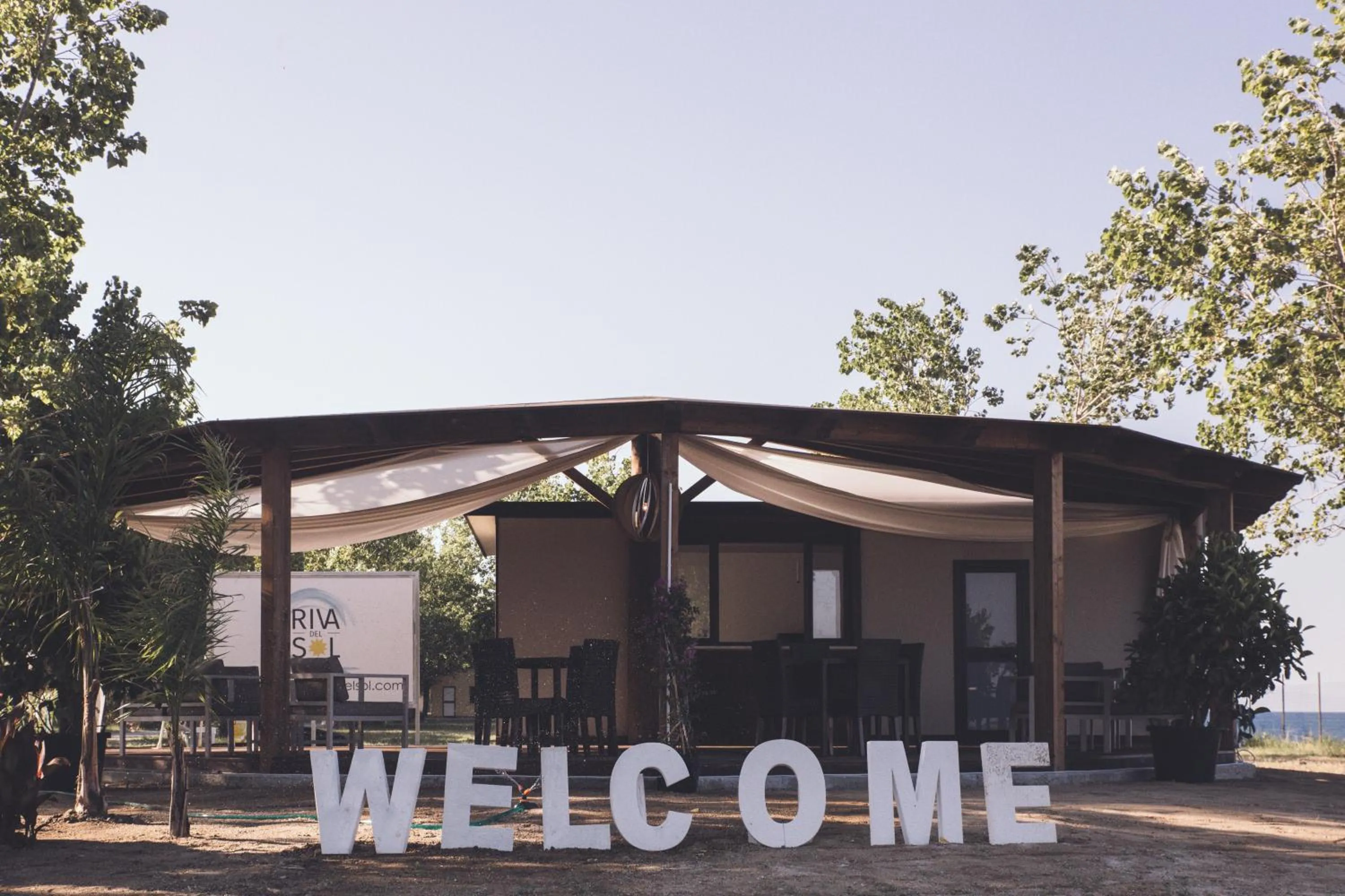 Property logo or sign in Riva del Sol Beach Resort