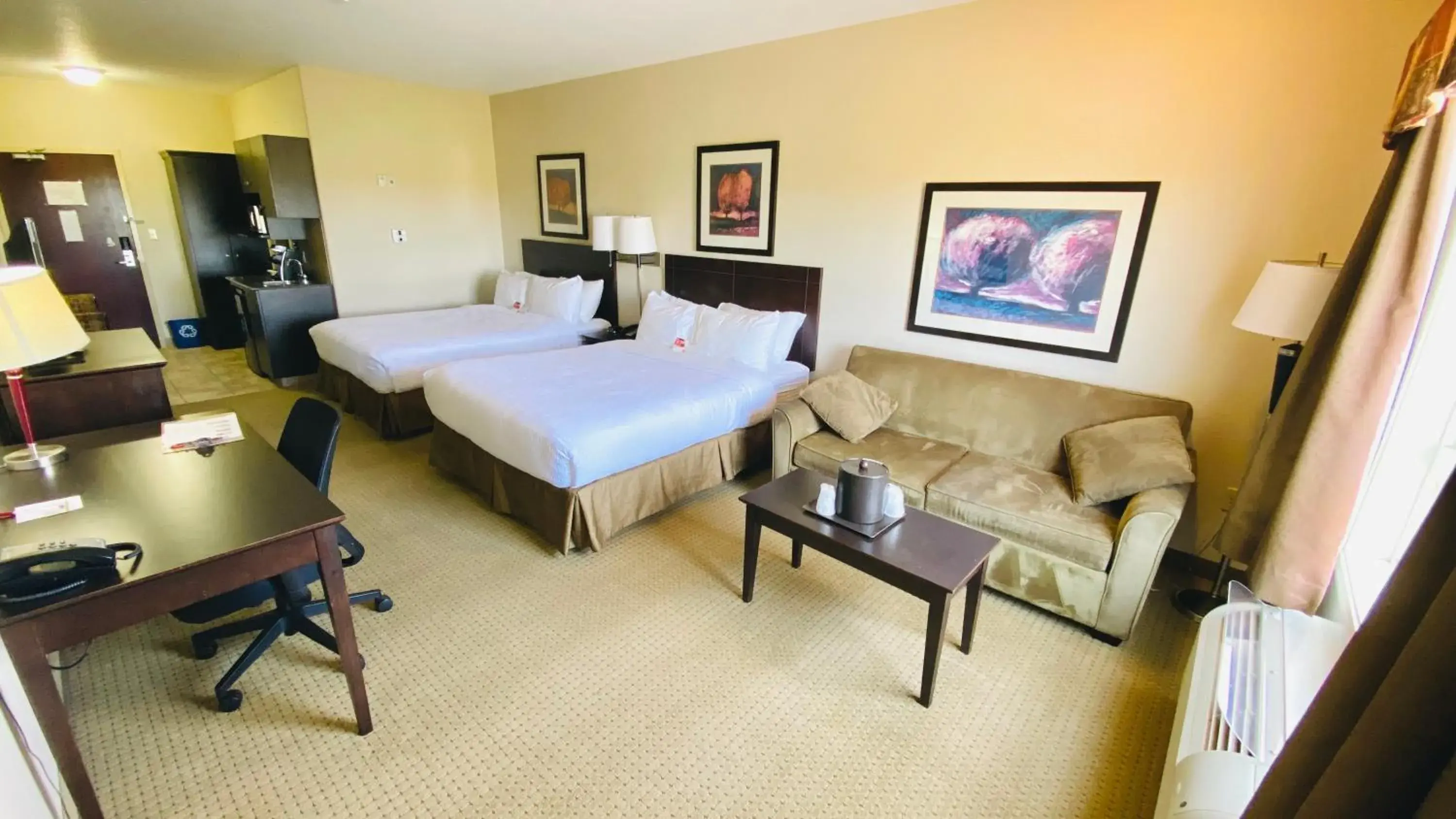 Seating area, Bed in Ramada by Wyndham Westlock Seating area, Bed in Ramada by Wyndham Westlock