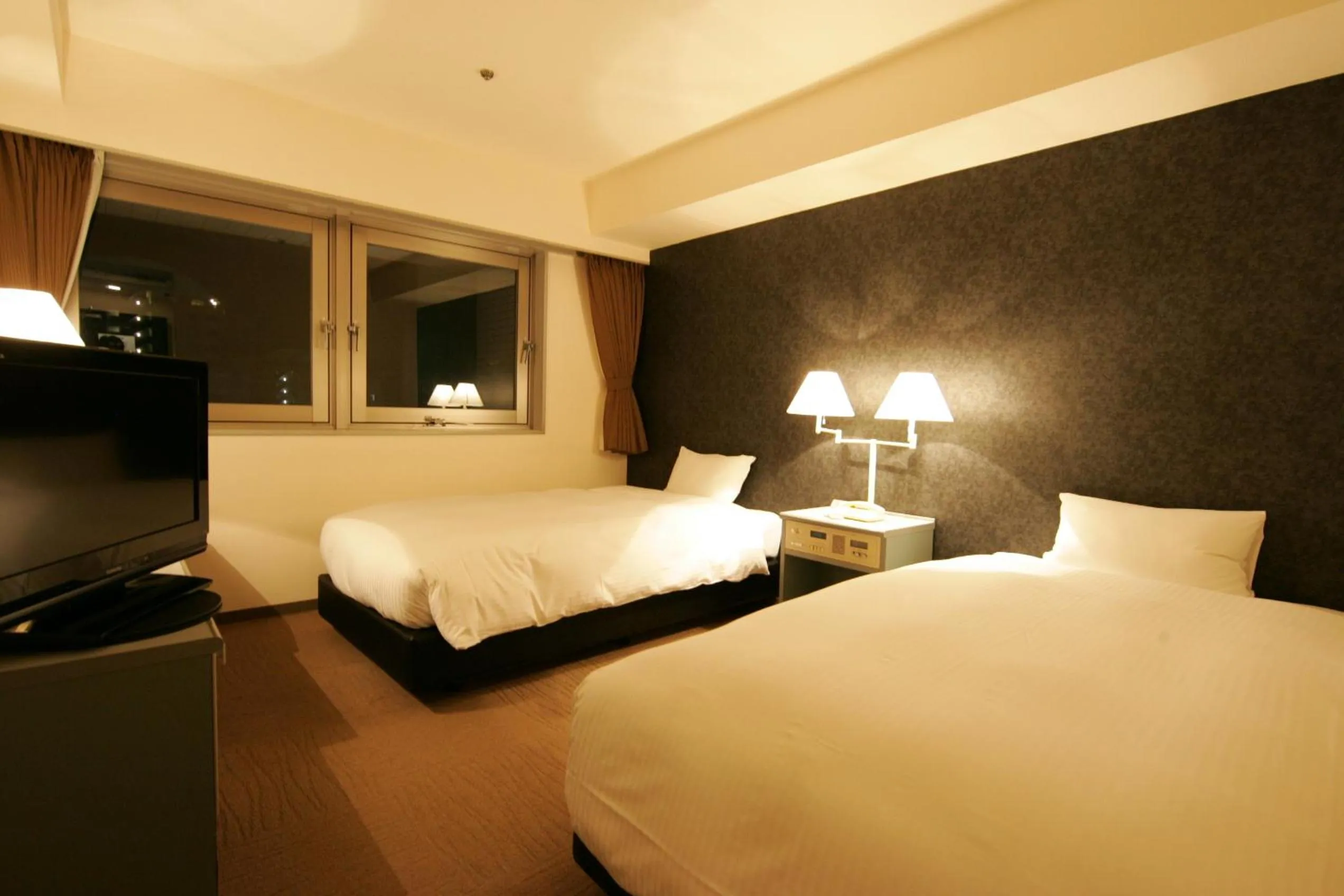 Photo of the whole room, Bed in Green Rich Hotel Nishitetsu Ohashi Ekimae