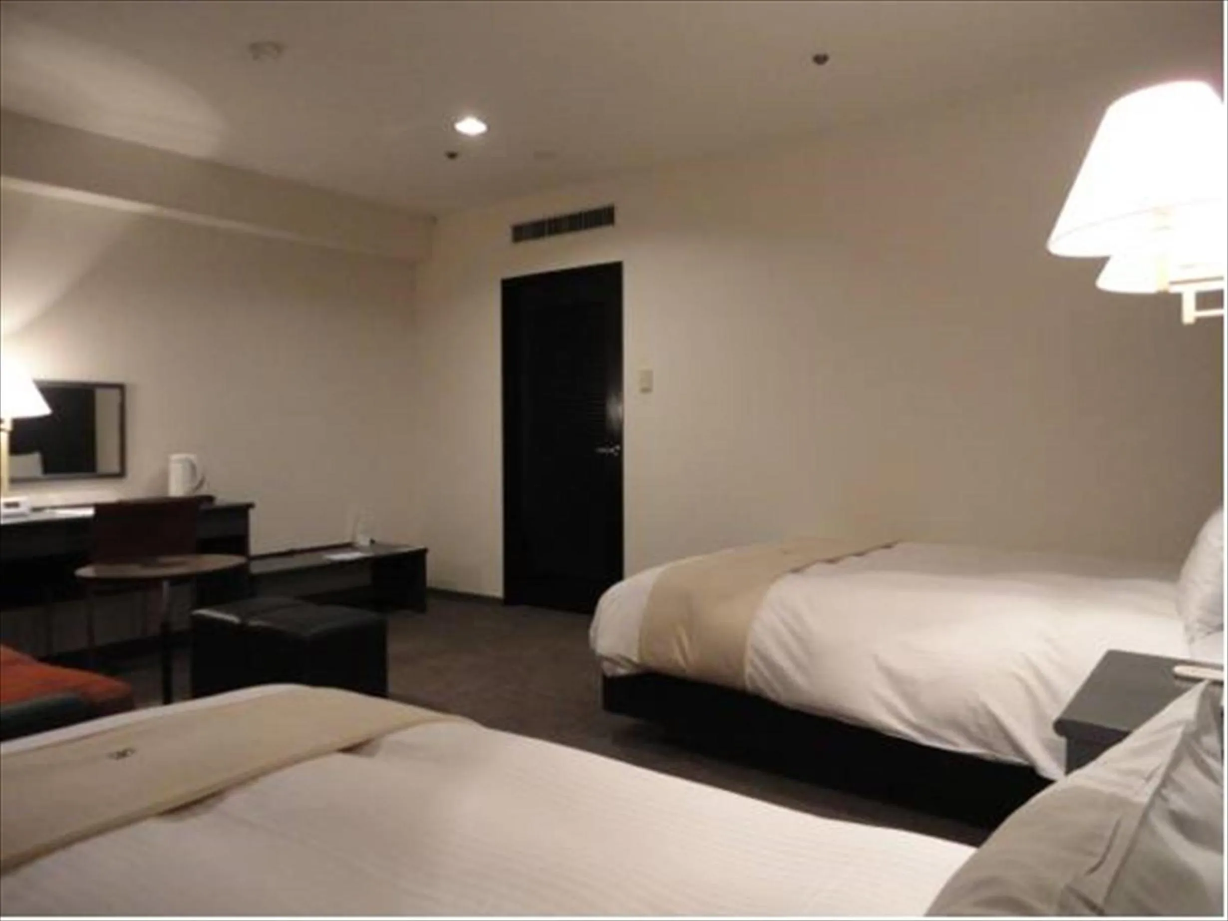 Photo of the whole room, Bed in Green Rich Hotel Nishitetsu Ohashi Ekimae