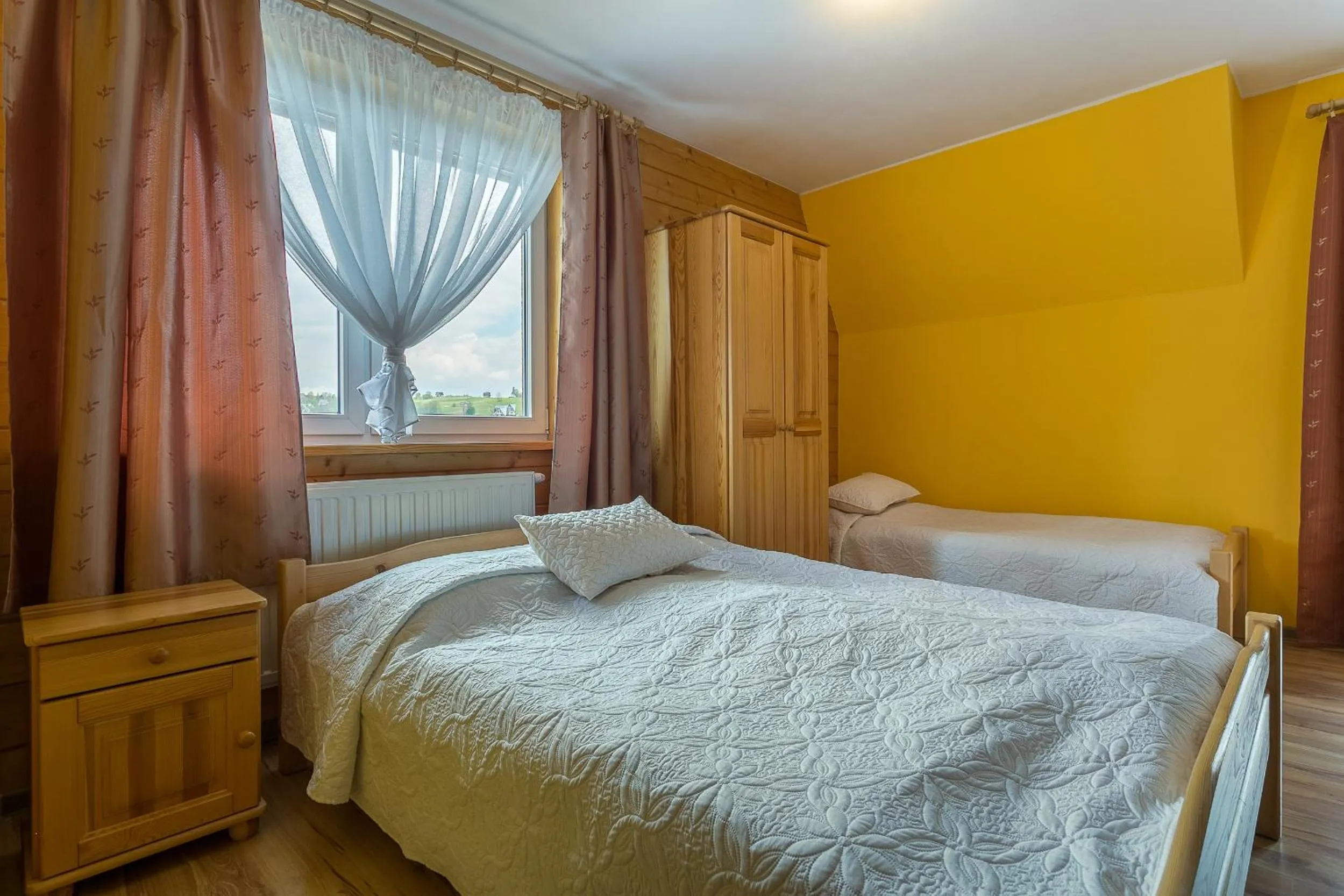 Garden view, Bed in Tatrzańska Rezydencja pod Brzyzkiem