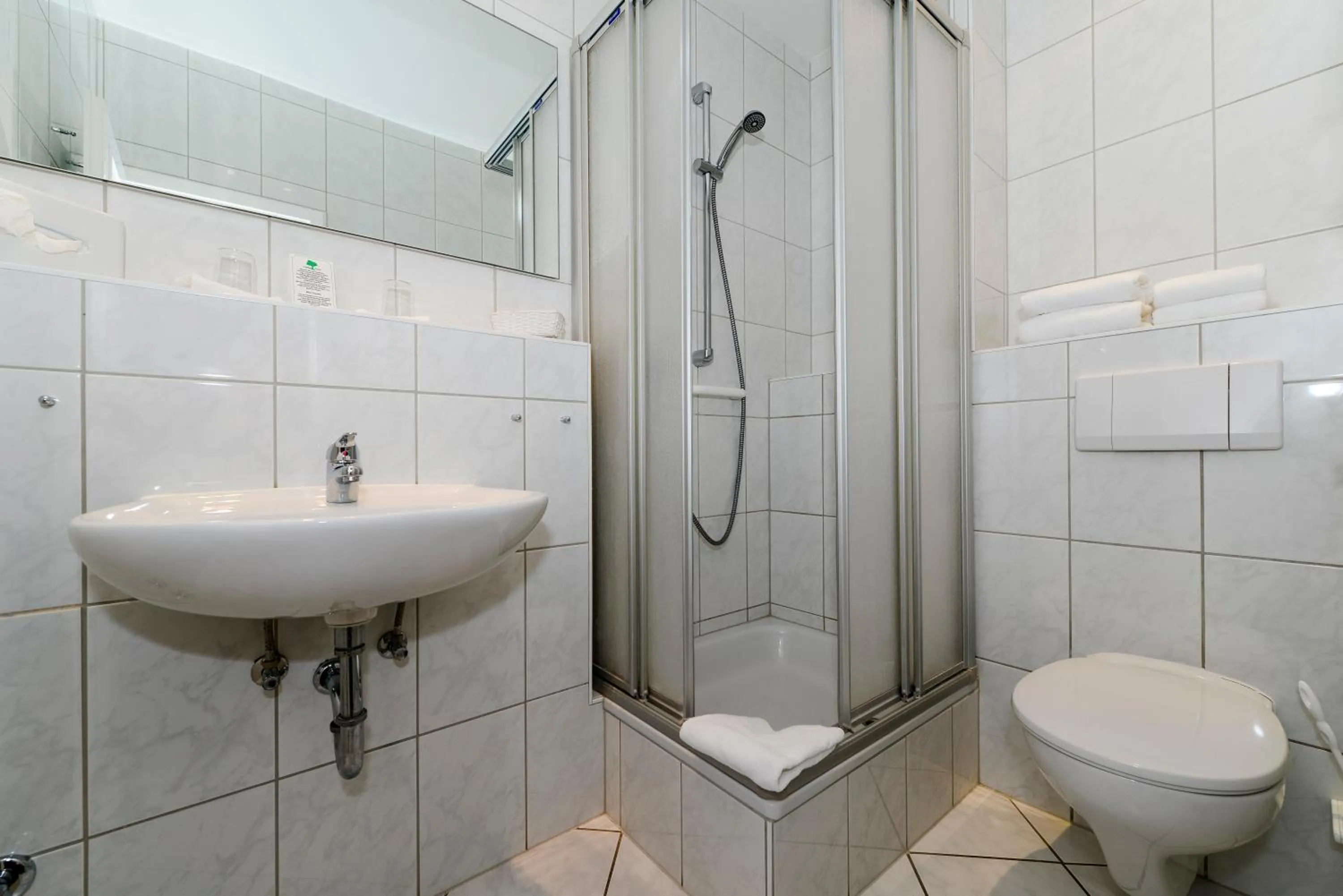 Bathroom in Kurhaus Hotel