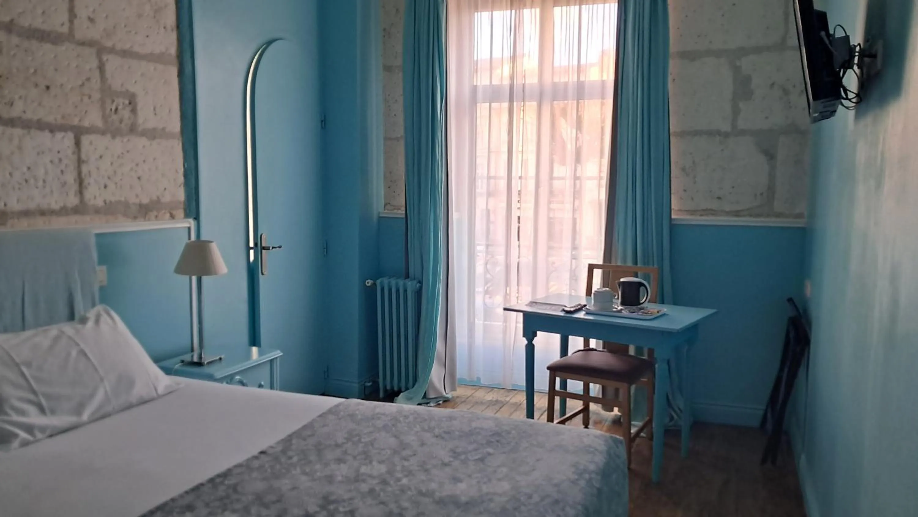 Bed in Hôtel du Palais