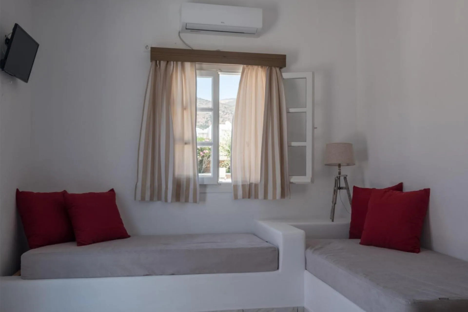 Bed in Paradise Apartments Studios