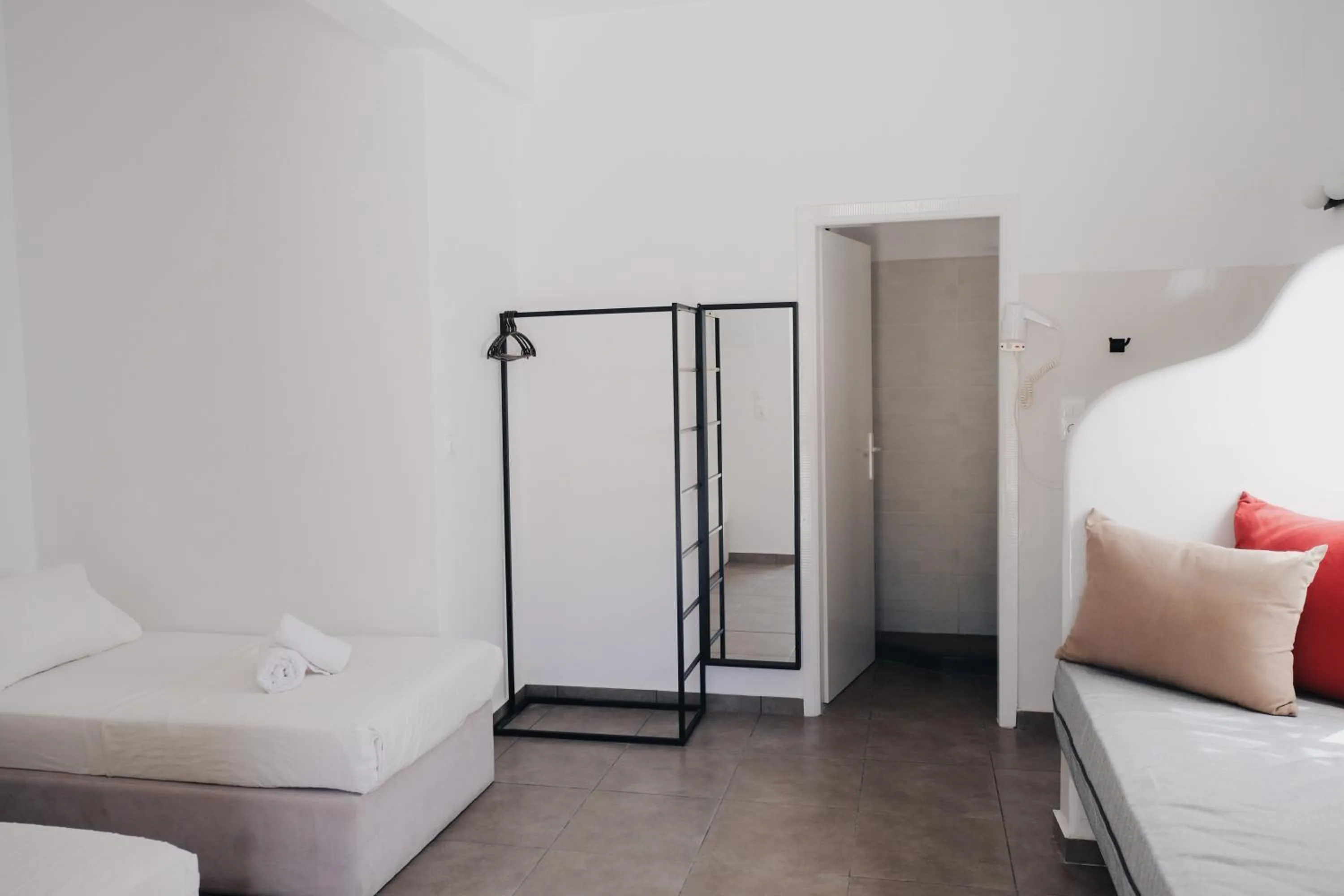 Bed in Paradise Apartments Studios