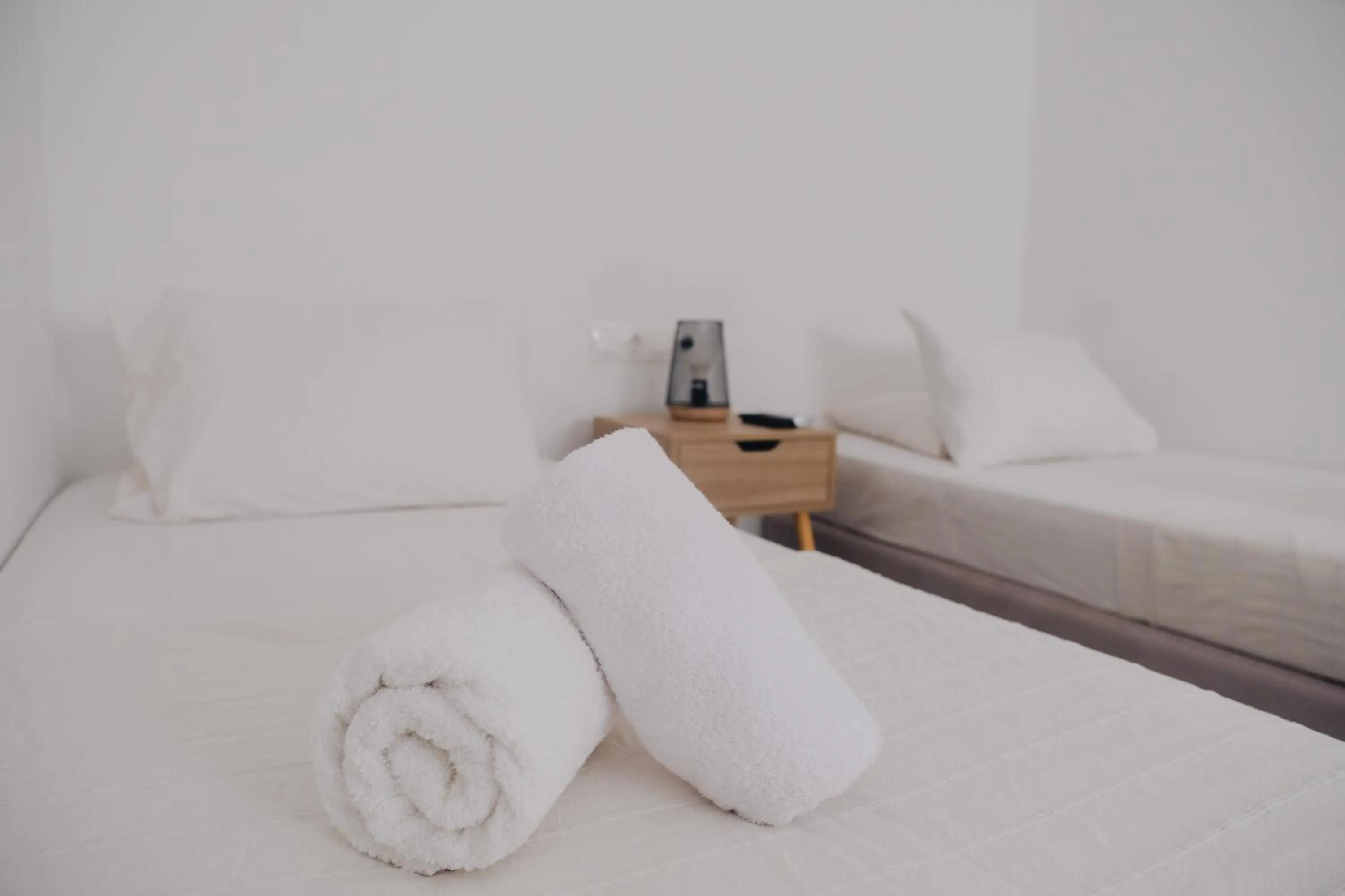 Bed in Paradise Apartments Studios