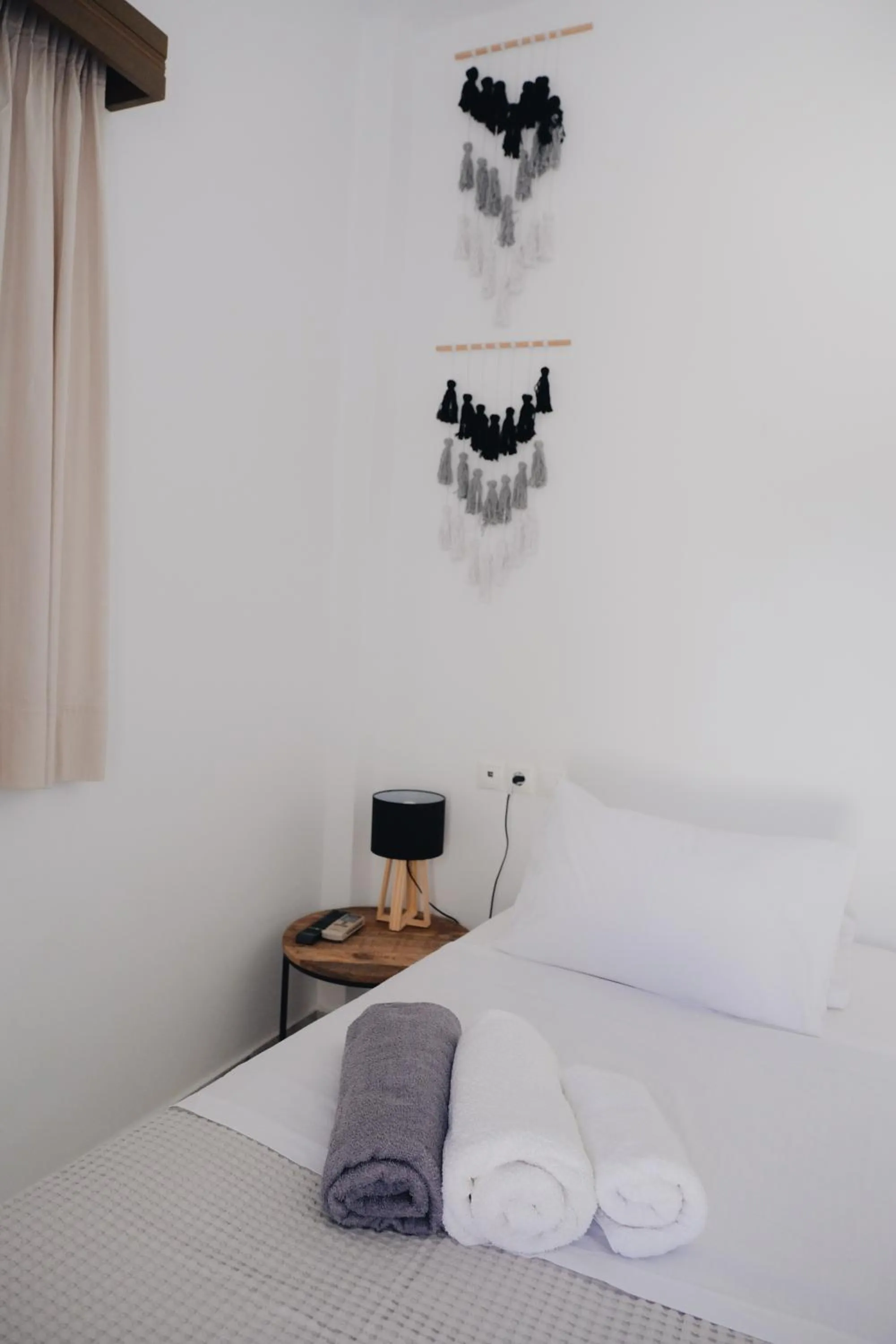 Bed in Paradise Apartments Studios