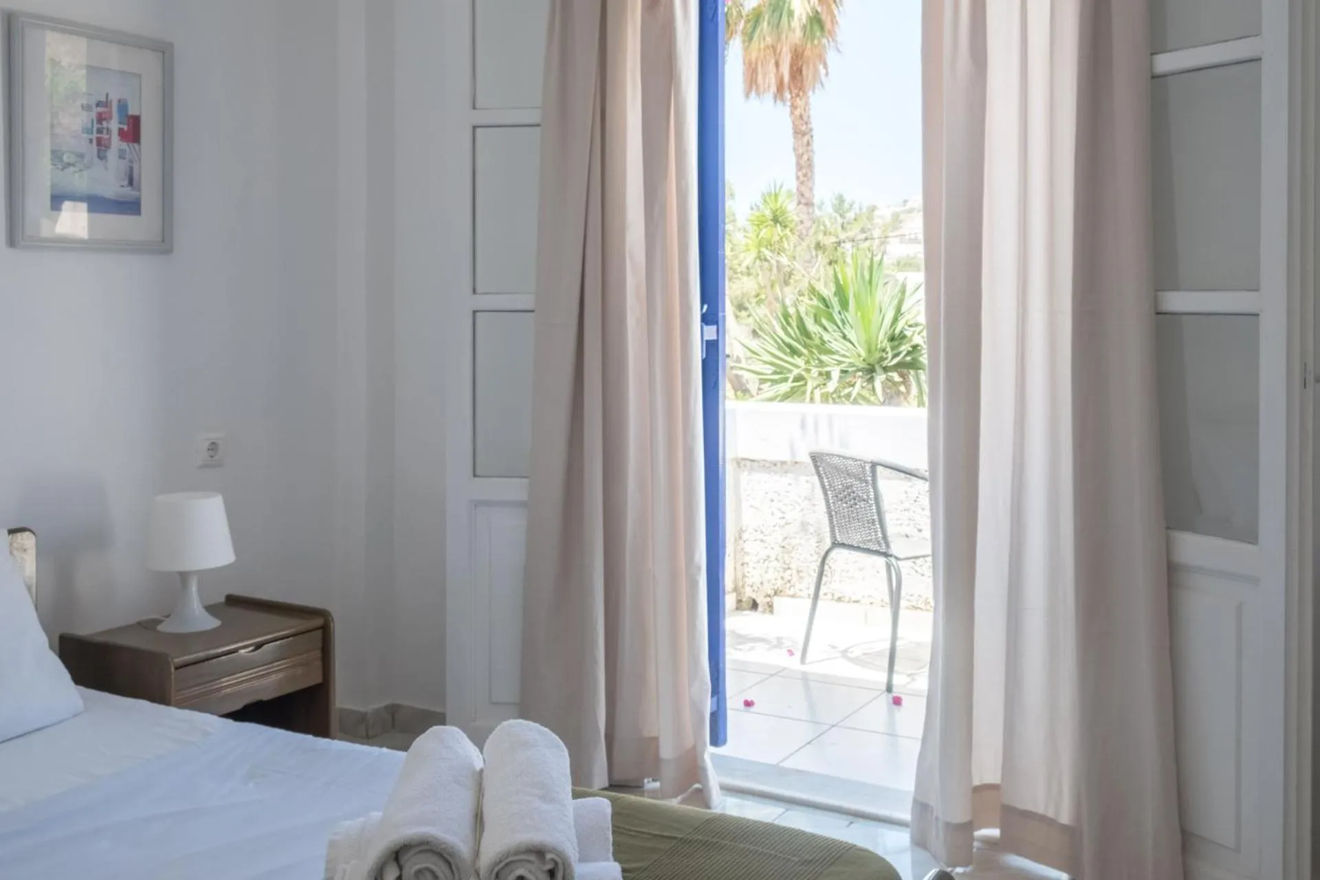 Bed in Paradise Apartments Studios