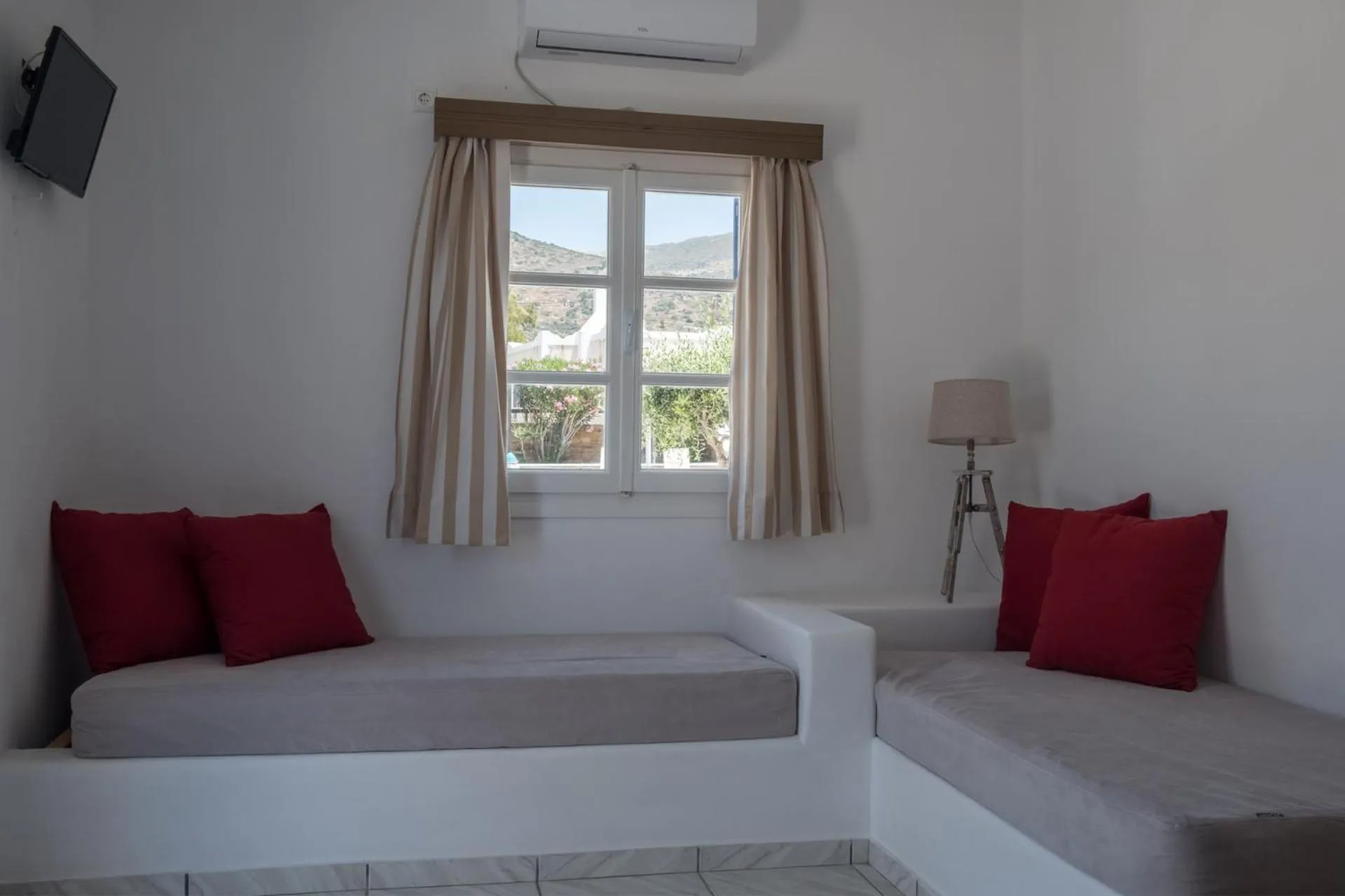 Bed in Paradise Apartments Studios