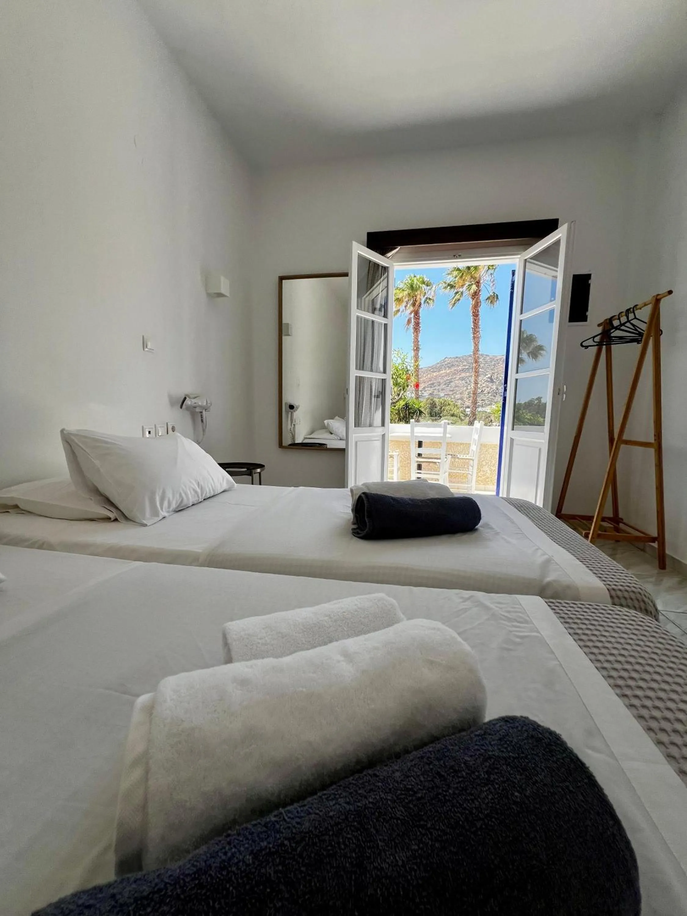 Bed in Paradise Apartments Studios