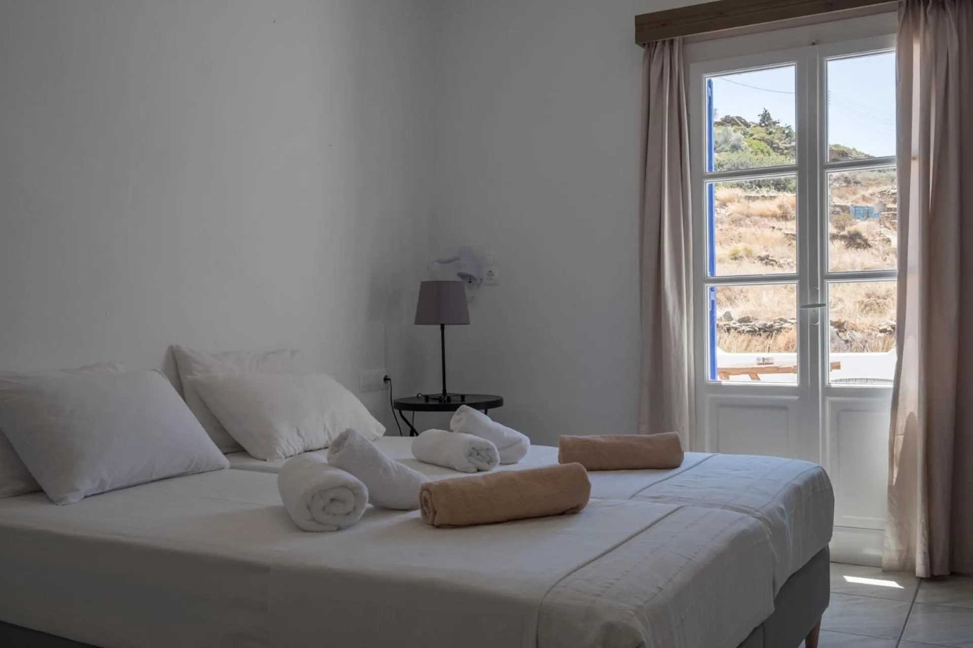 Bed in Paradise Apartments Studios