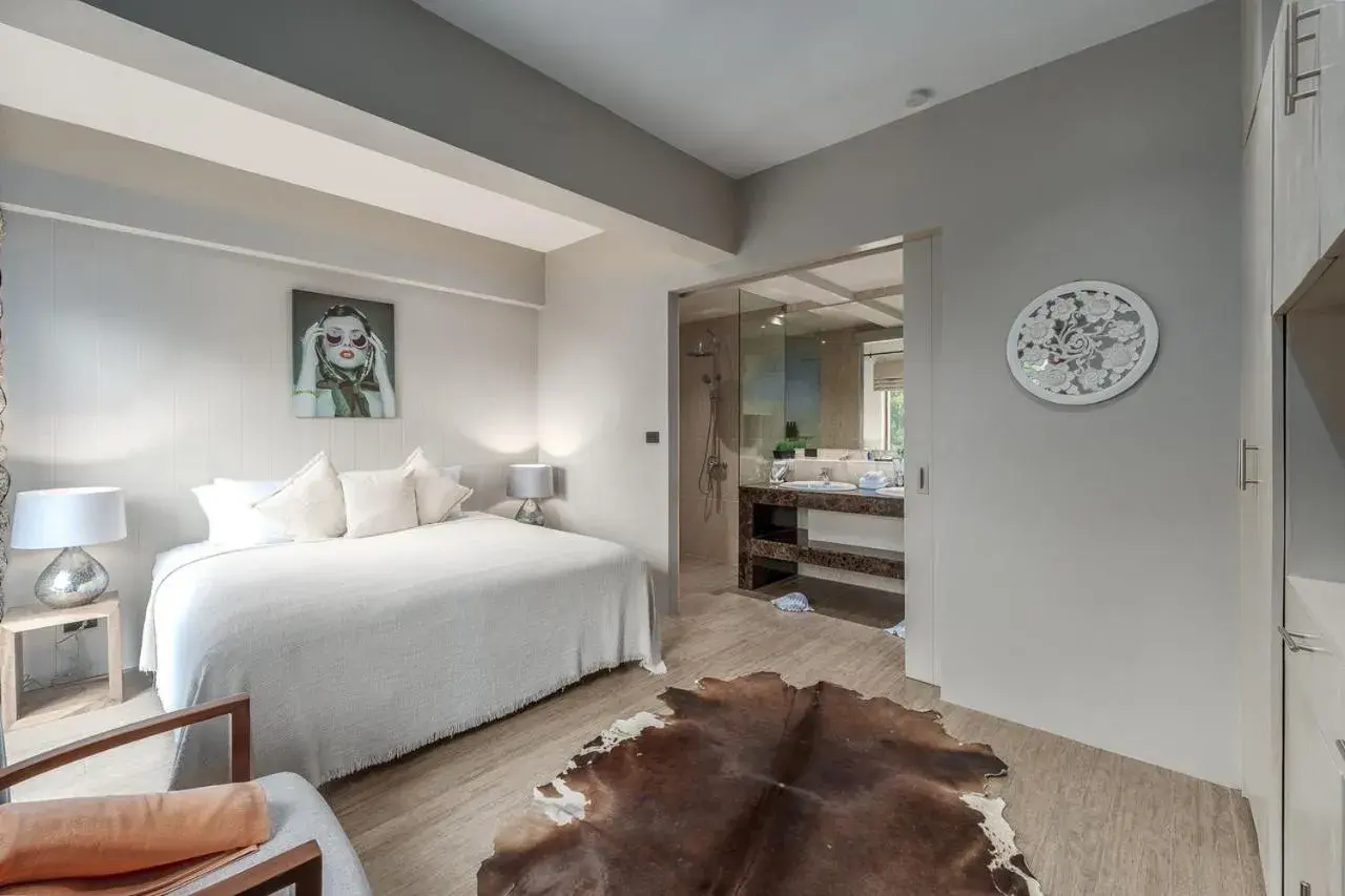 Bed in Baan Phu Prana Boutique Villa Bed in Baan Phu Prana Boutique Villa