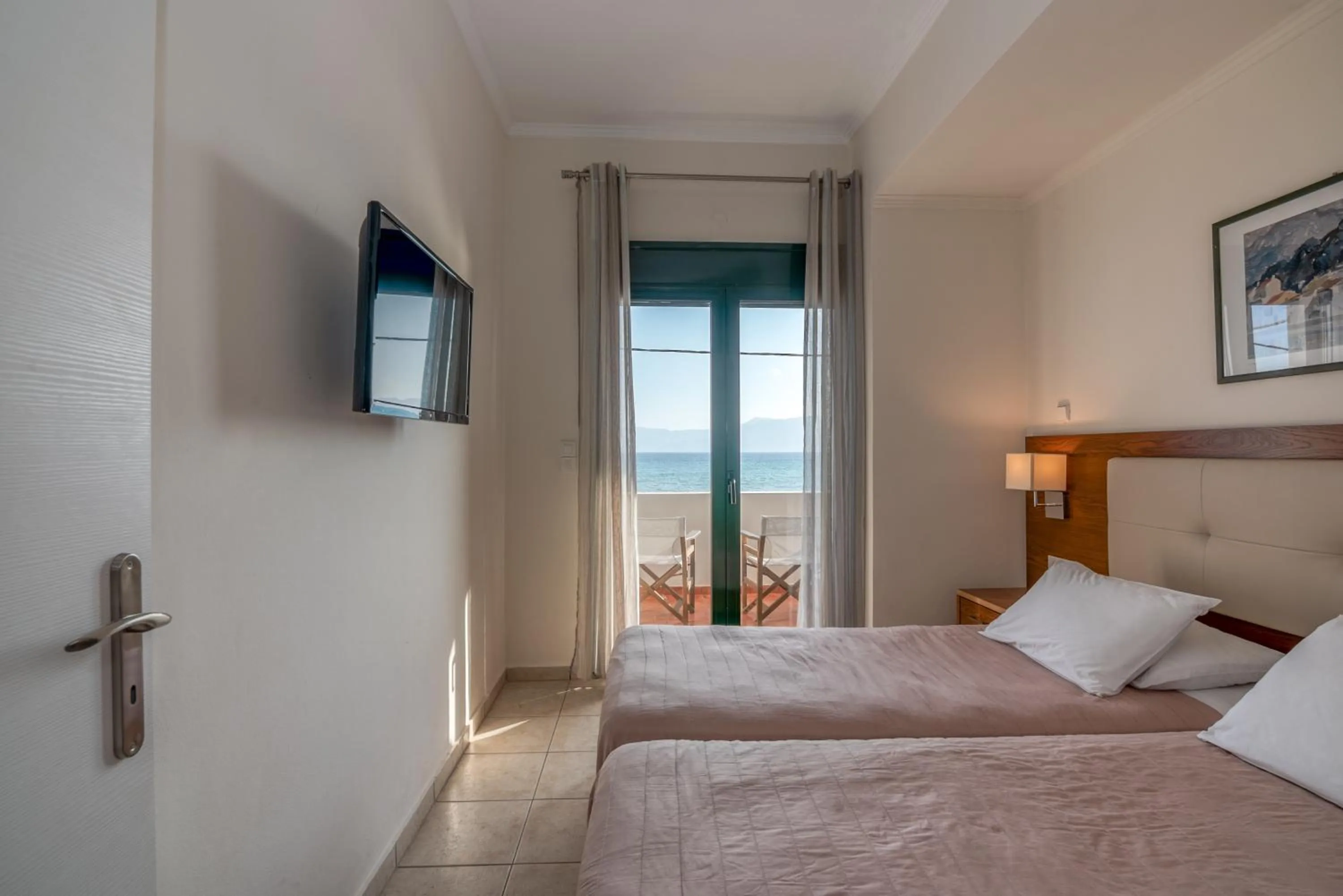 Bed in Christina Beach Hotel