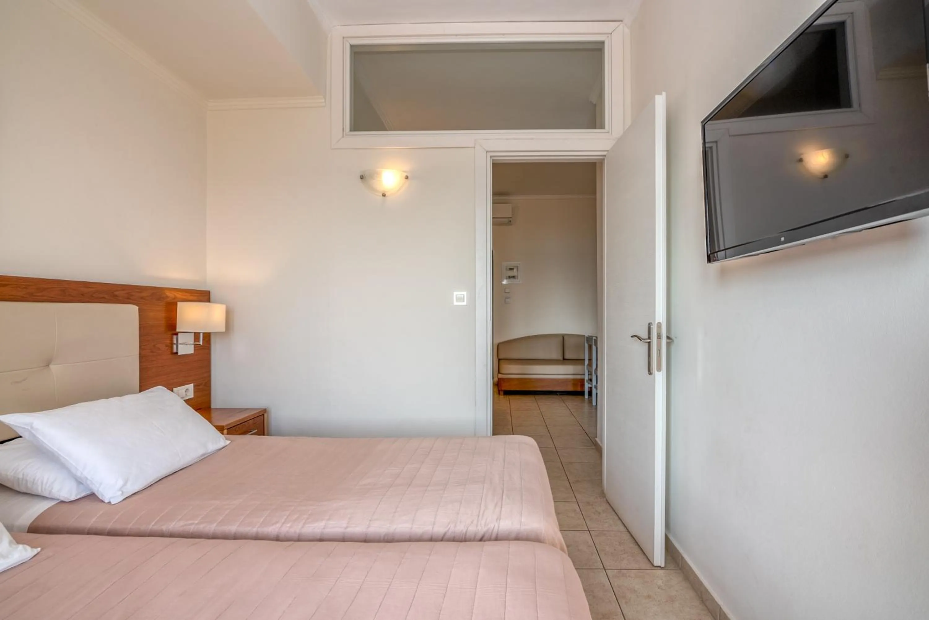 Bed in Christina Beach Hotel