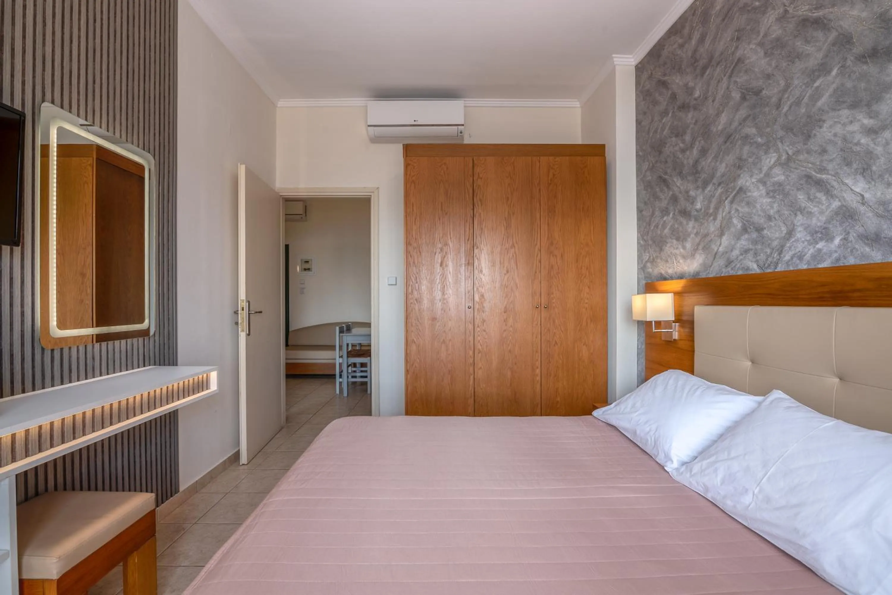 Bed in Christina Beach Hotel