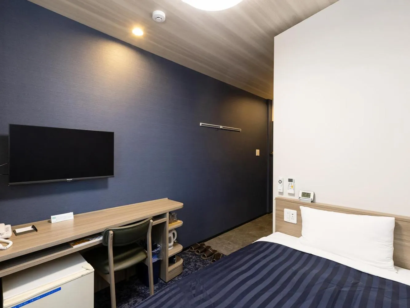 Bed in Kyoto Plaza Hotel