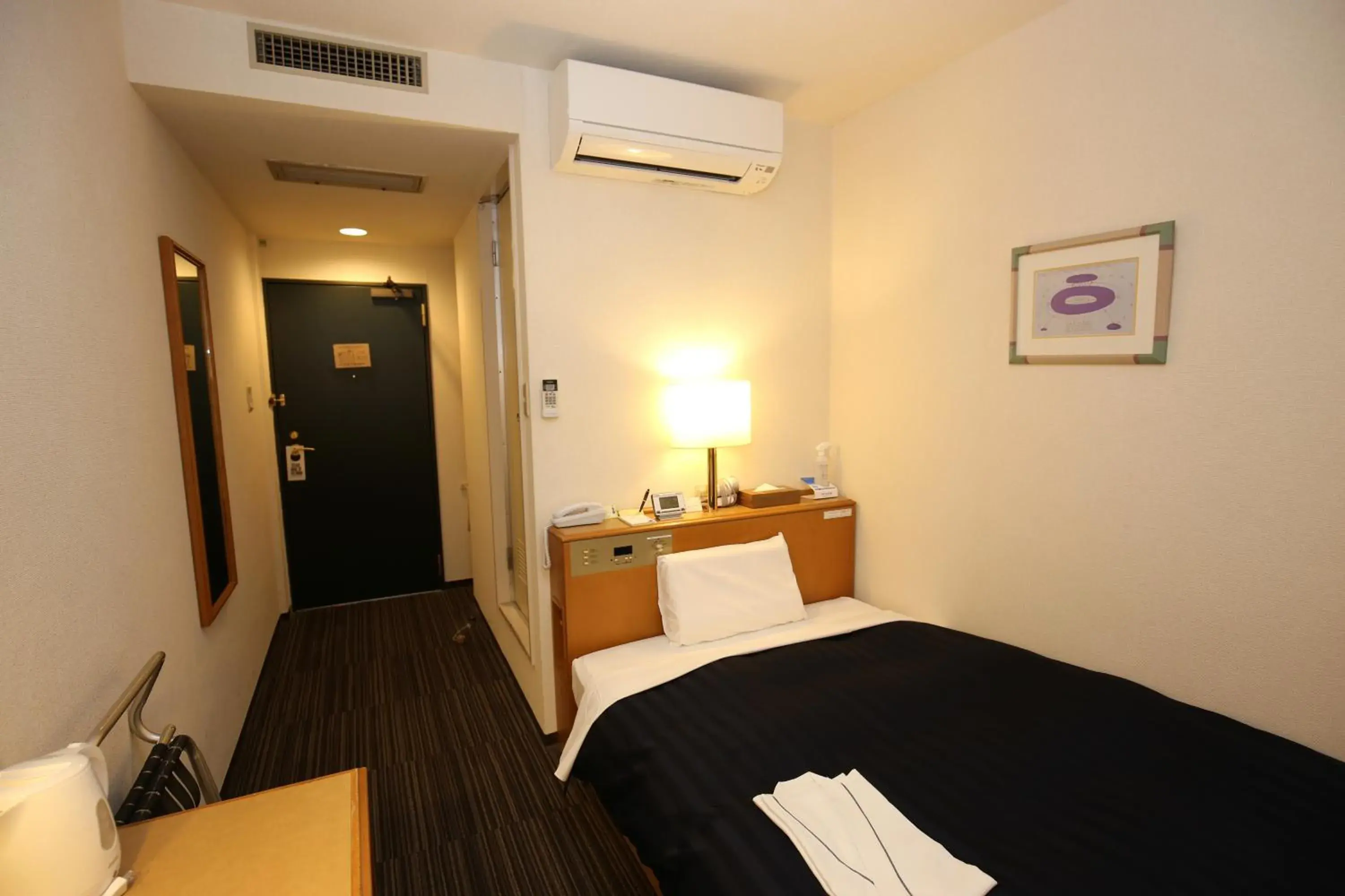 Photo of the whole room, Bed in Kyoto Plaza Hotel Photo of the whole room, Bed in Kyoto Plaza Hotel