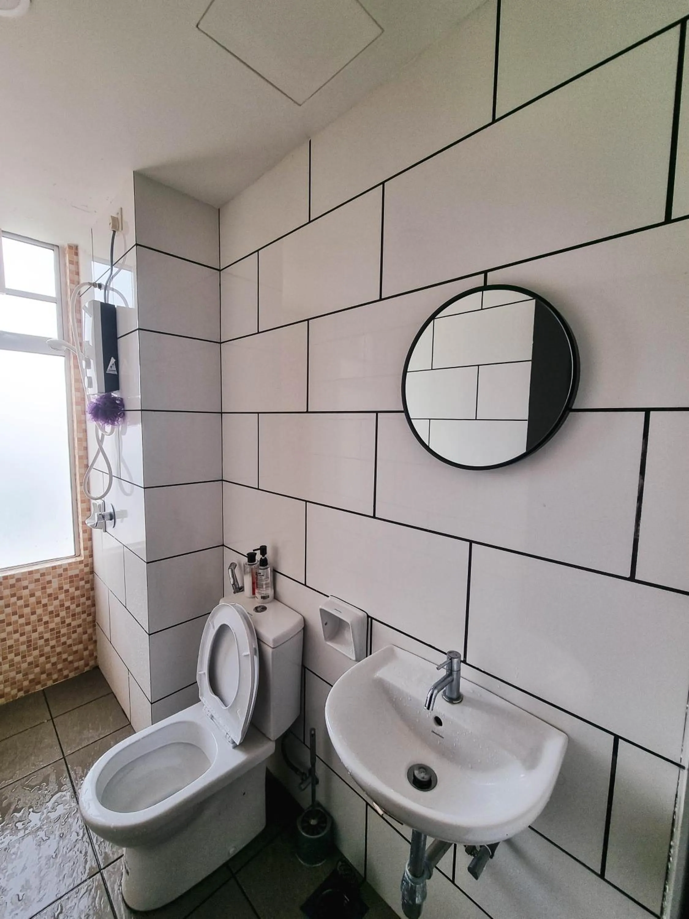 Toilet in Taiping Centre Point Suite 7 by BWC