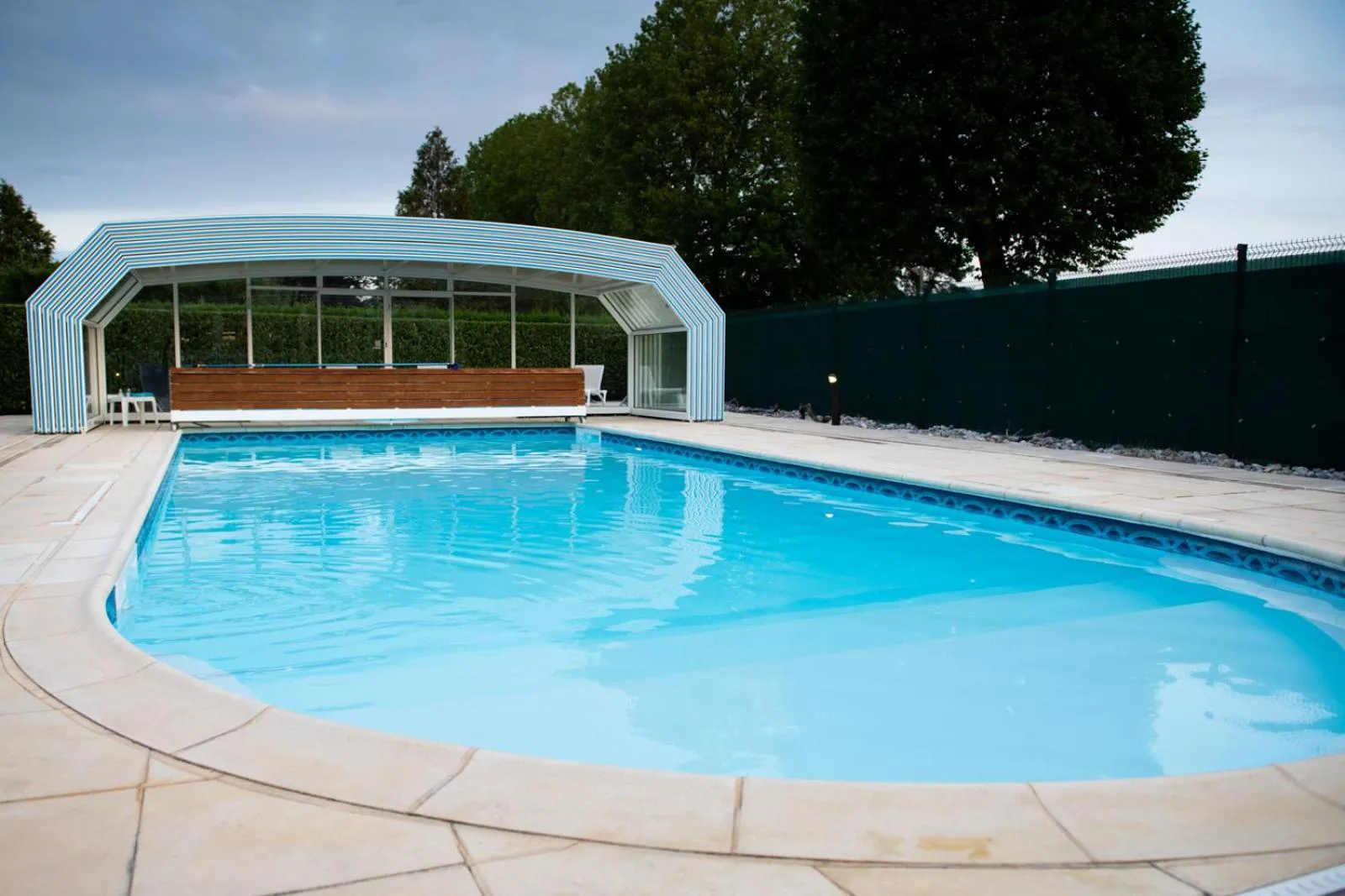 Swimming pool in Logis Hotel Restaurant L'Escapade