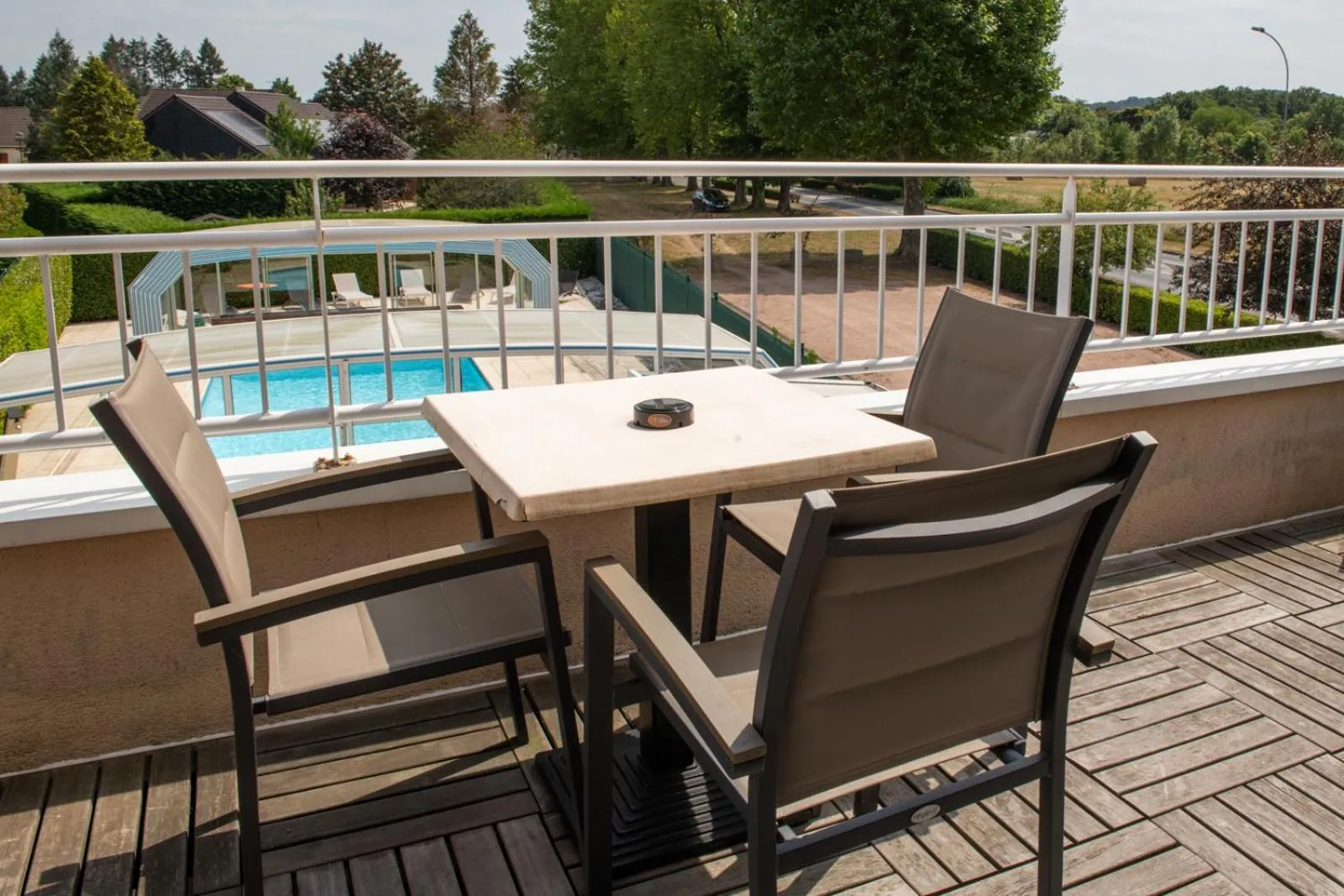 Patio in Logis Hotel Restaurant L'Escapade