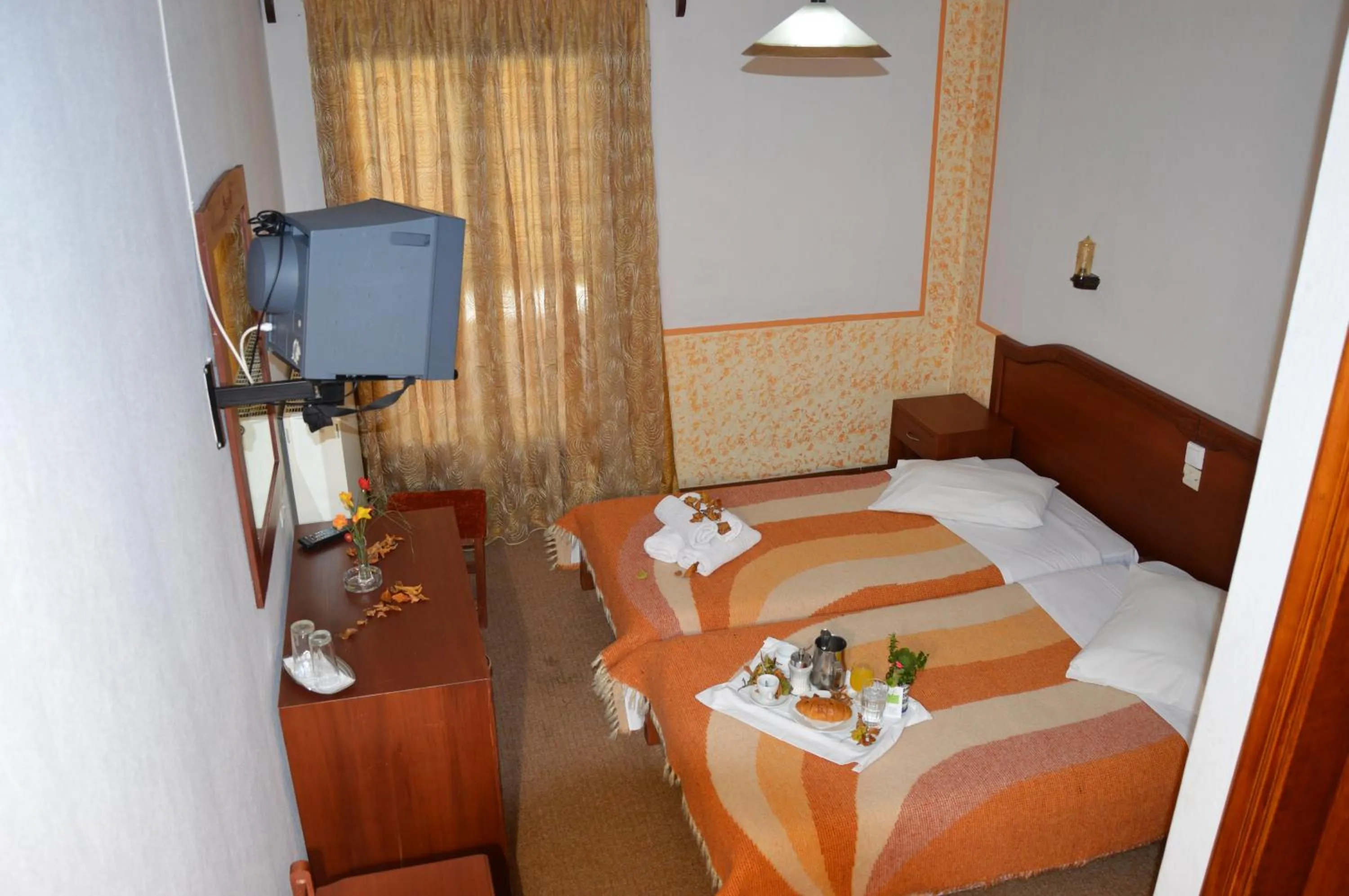 Bed in Hotel Hani Zisi