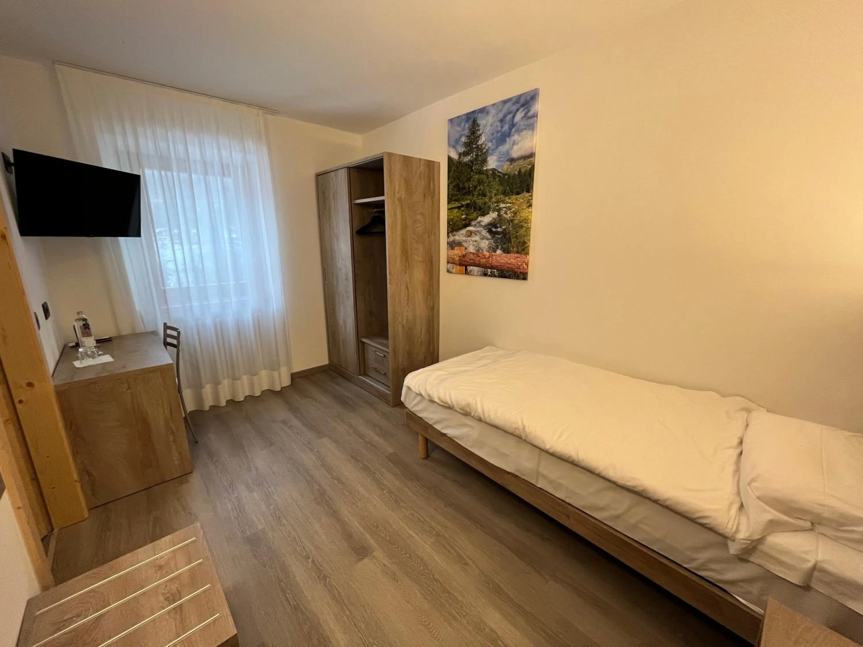 Bed in Hotel Zanella