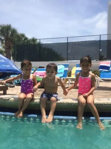 People in Oceanview on SAND located in Ocean Manor Resort Fort Lauderdale Beach 2 bed 2 bath spacious corner unit partial ocean view