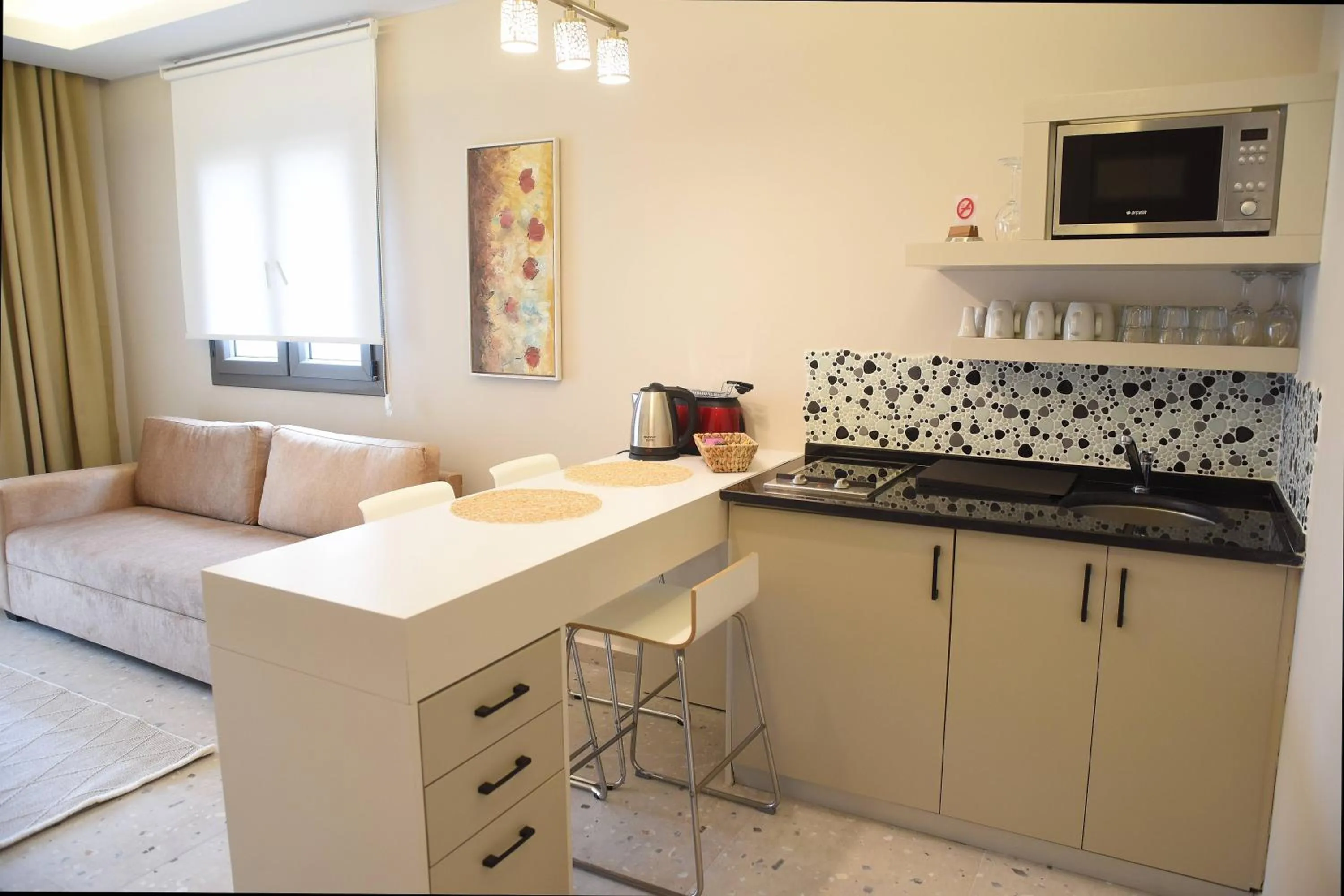 Kitchen or kitchenette in Mozaik Hotel