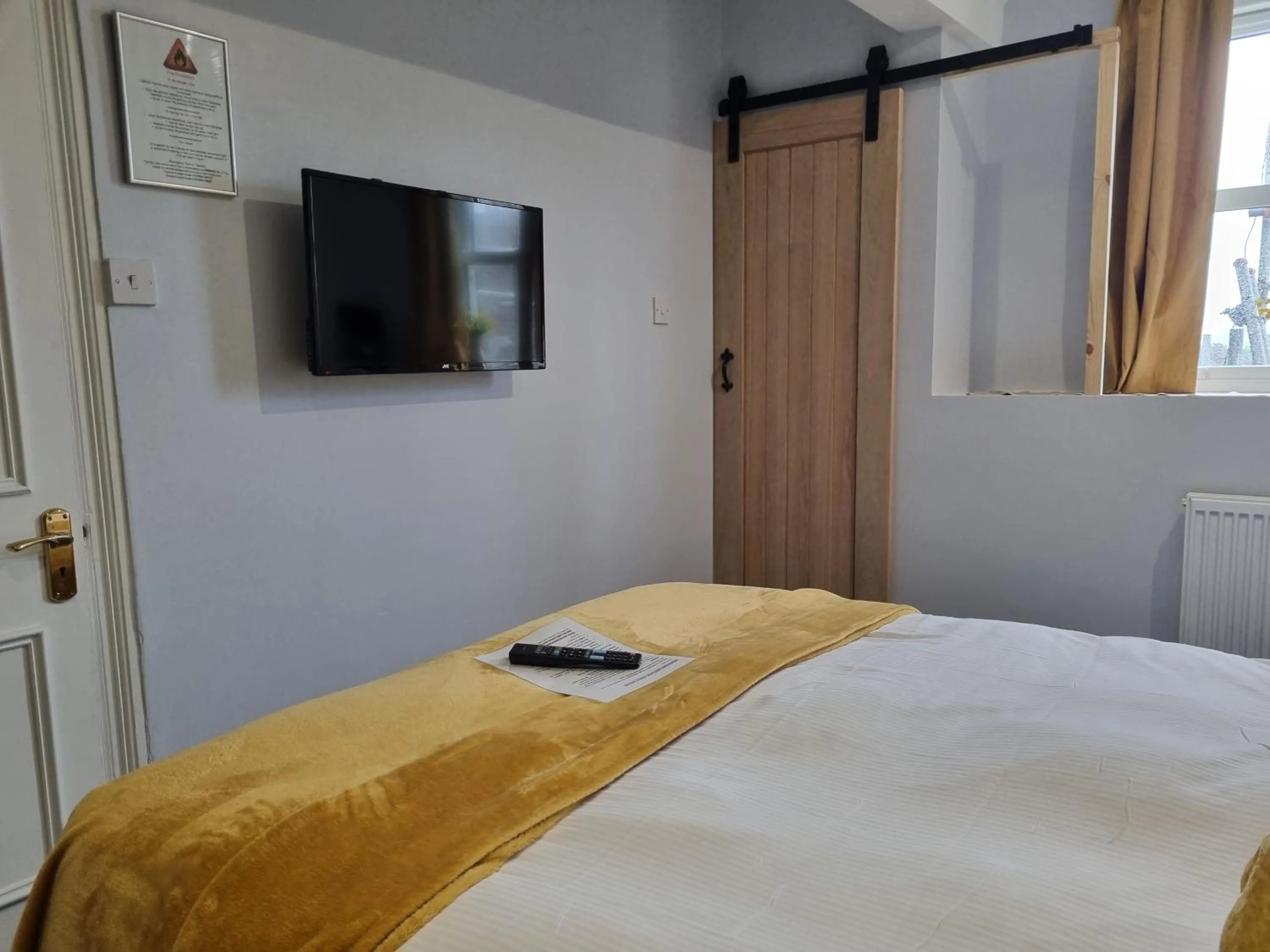 Bed in Montfort Cottage Guest House