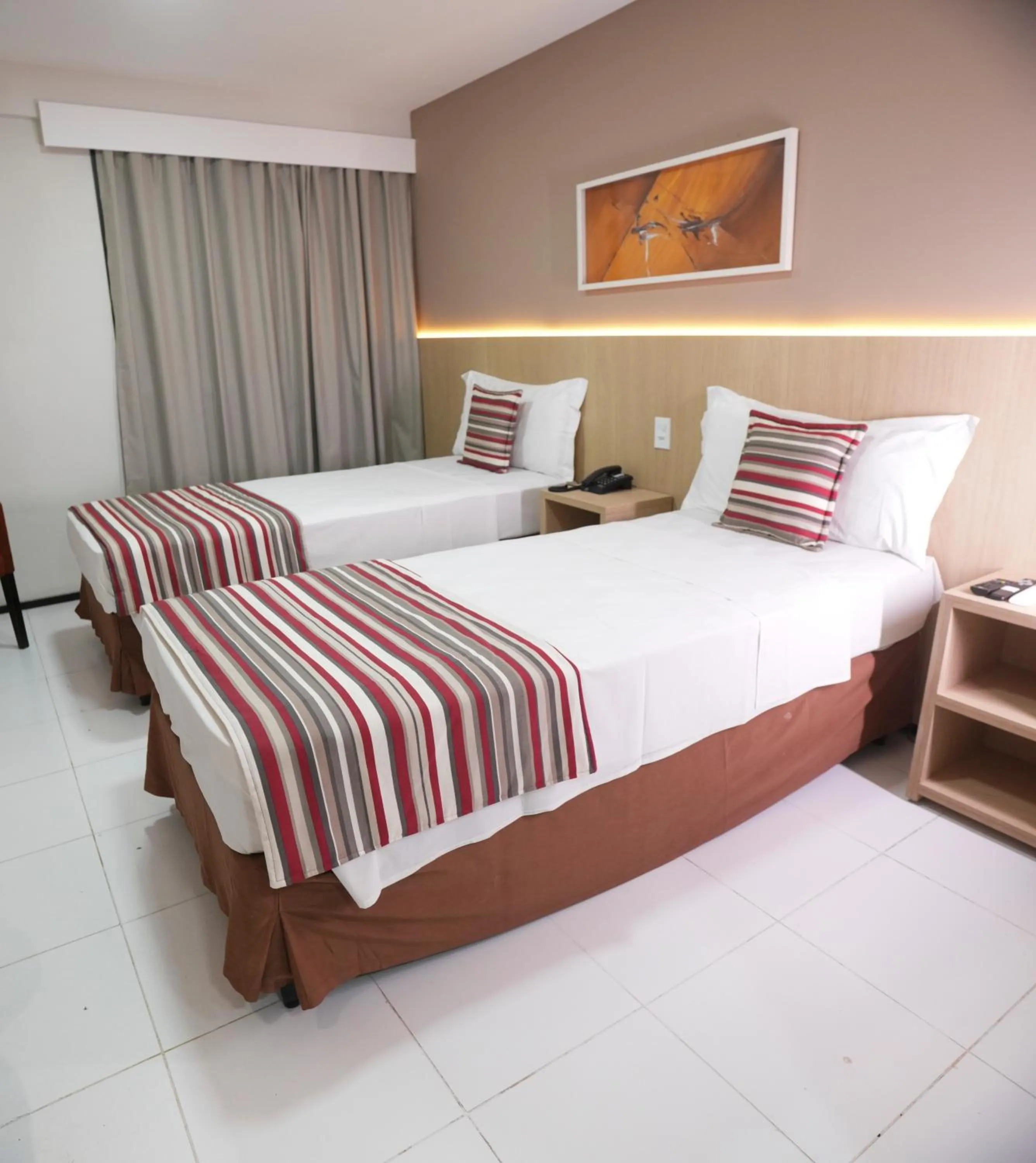 Bed in SLZ Lagoa Hotel