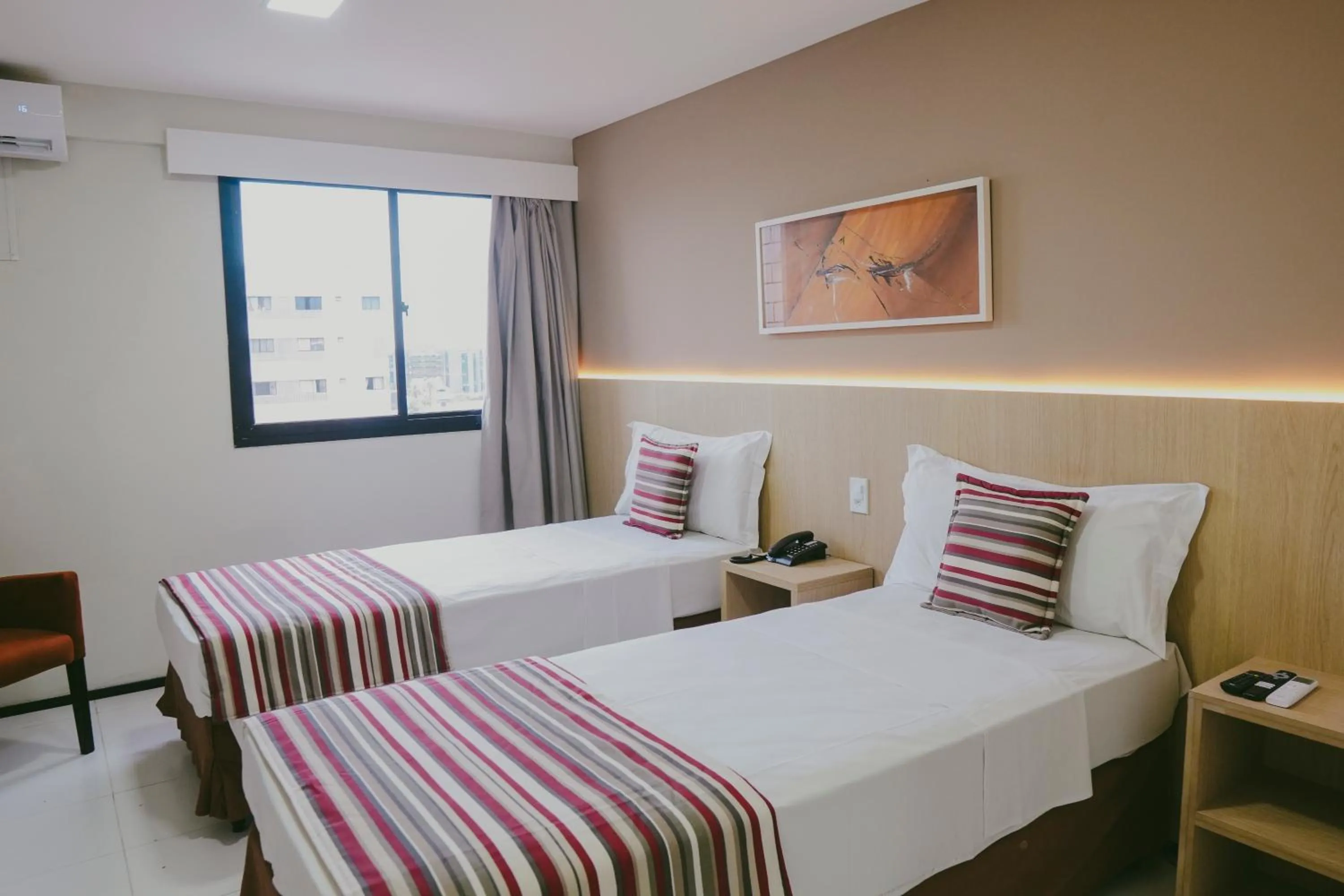 Bed in SLZ Lagoa Hotel