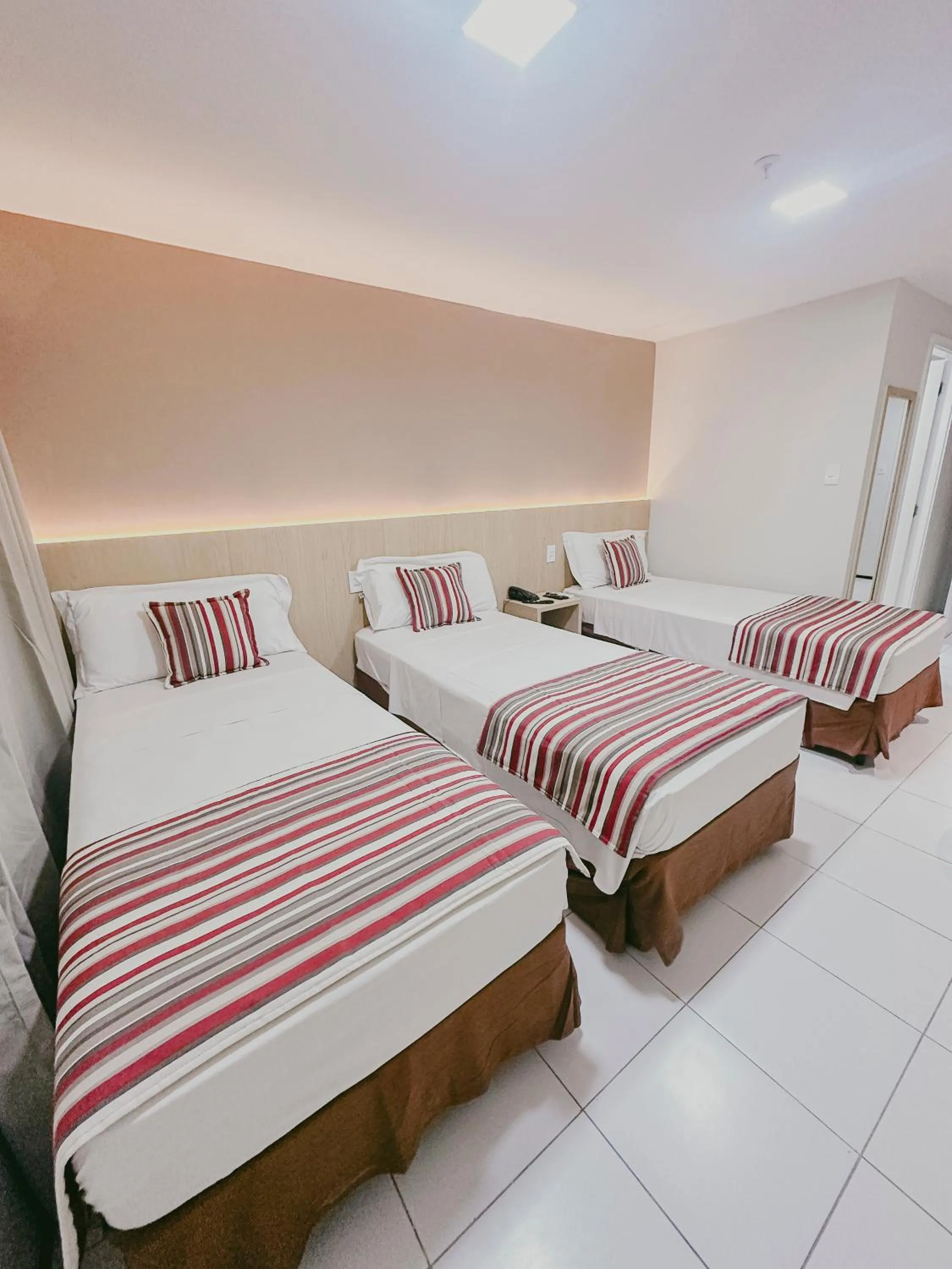 Bed in SLZ Lagoa Hotel