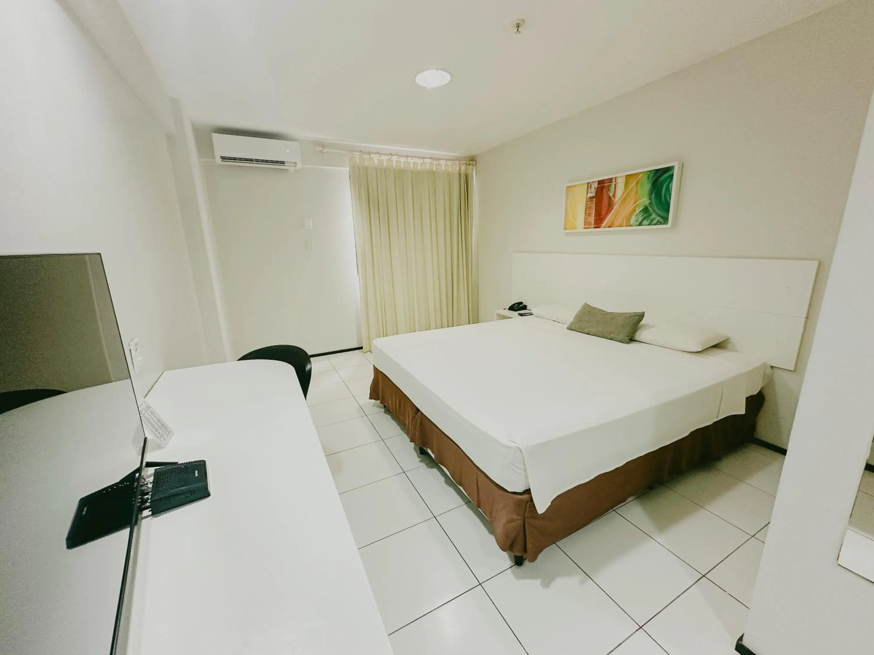 Bed in SLZ Lagoa Hotel