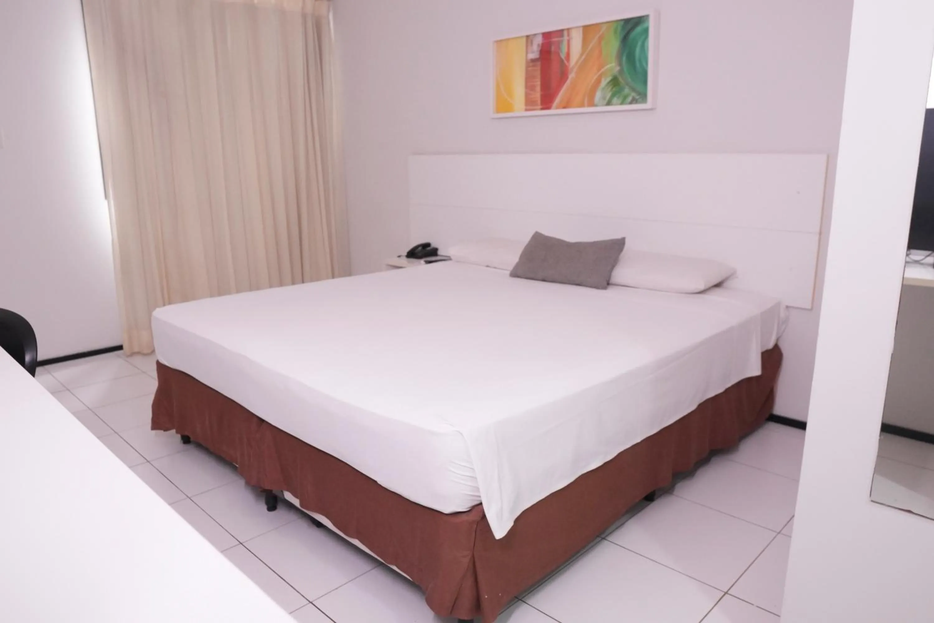 Bed in SLZ Lagoa Hotel
