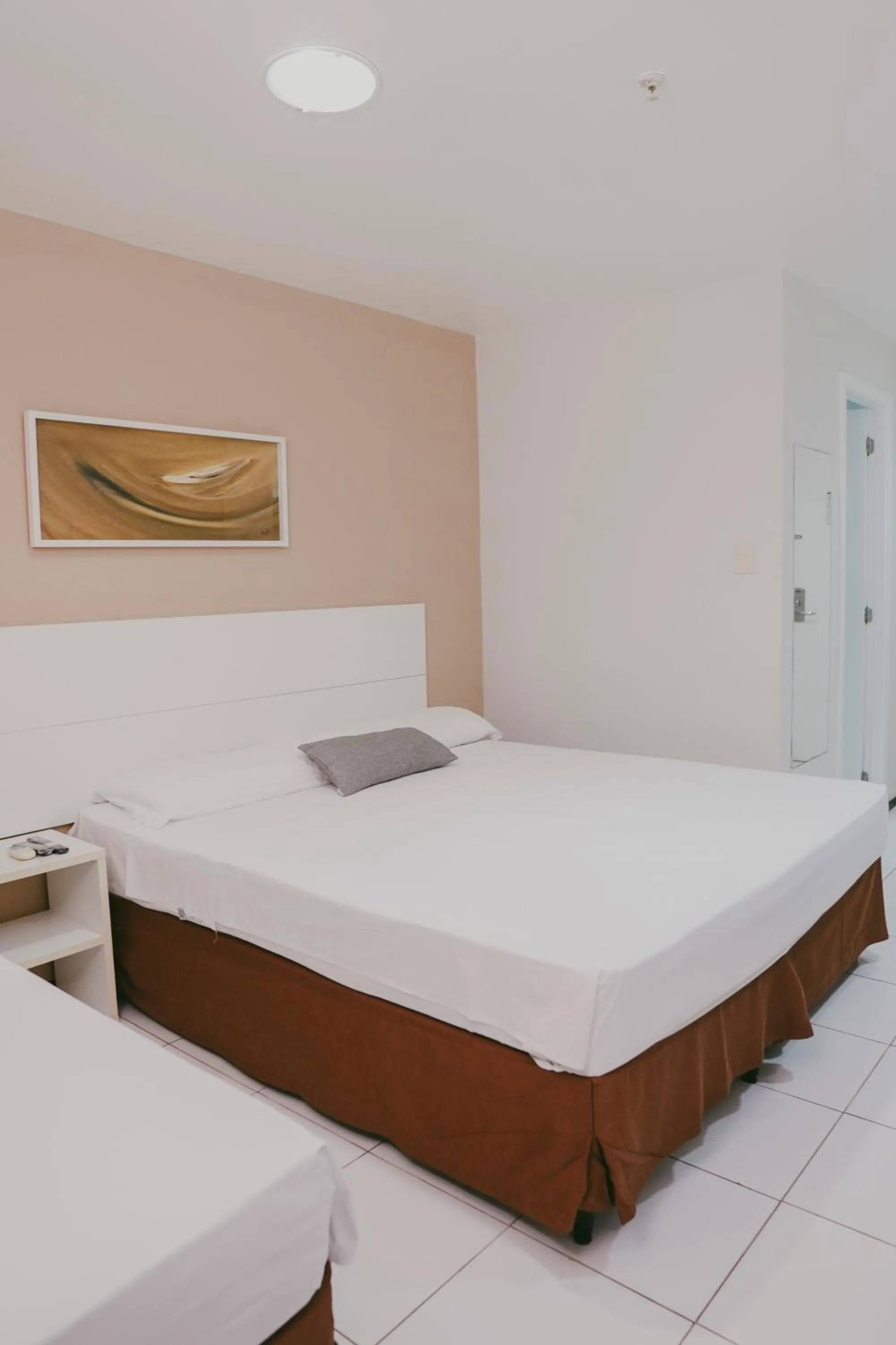 Bed in SLZ Lagoa Hotel