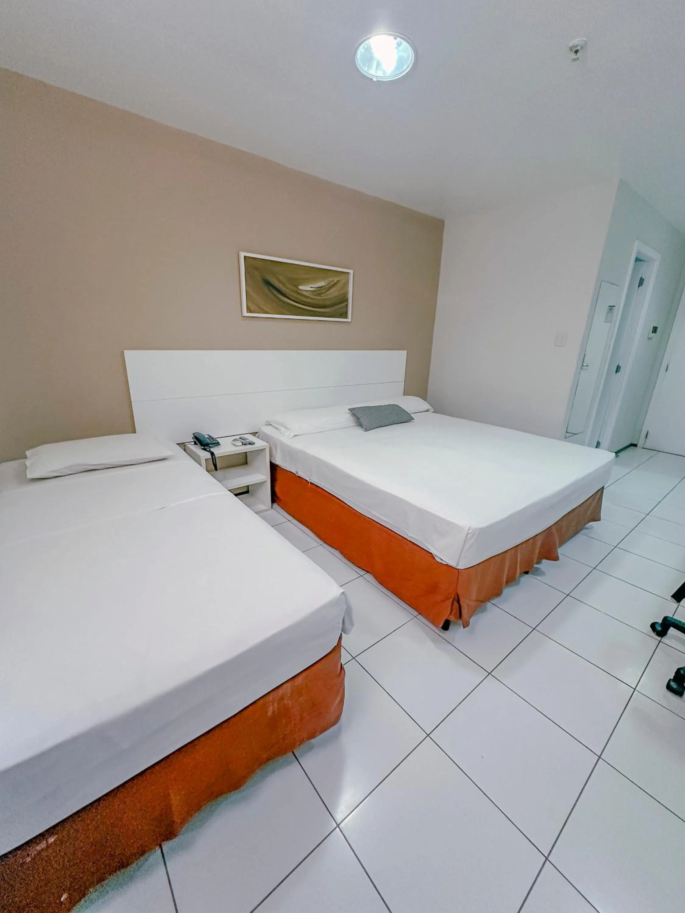 Bed in SLZ Lagoa Hotel