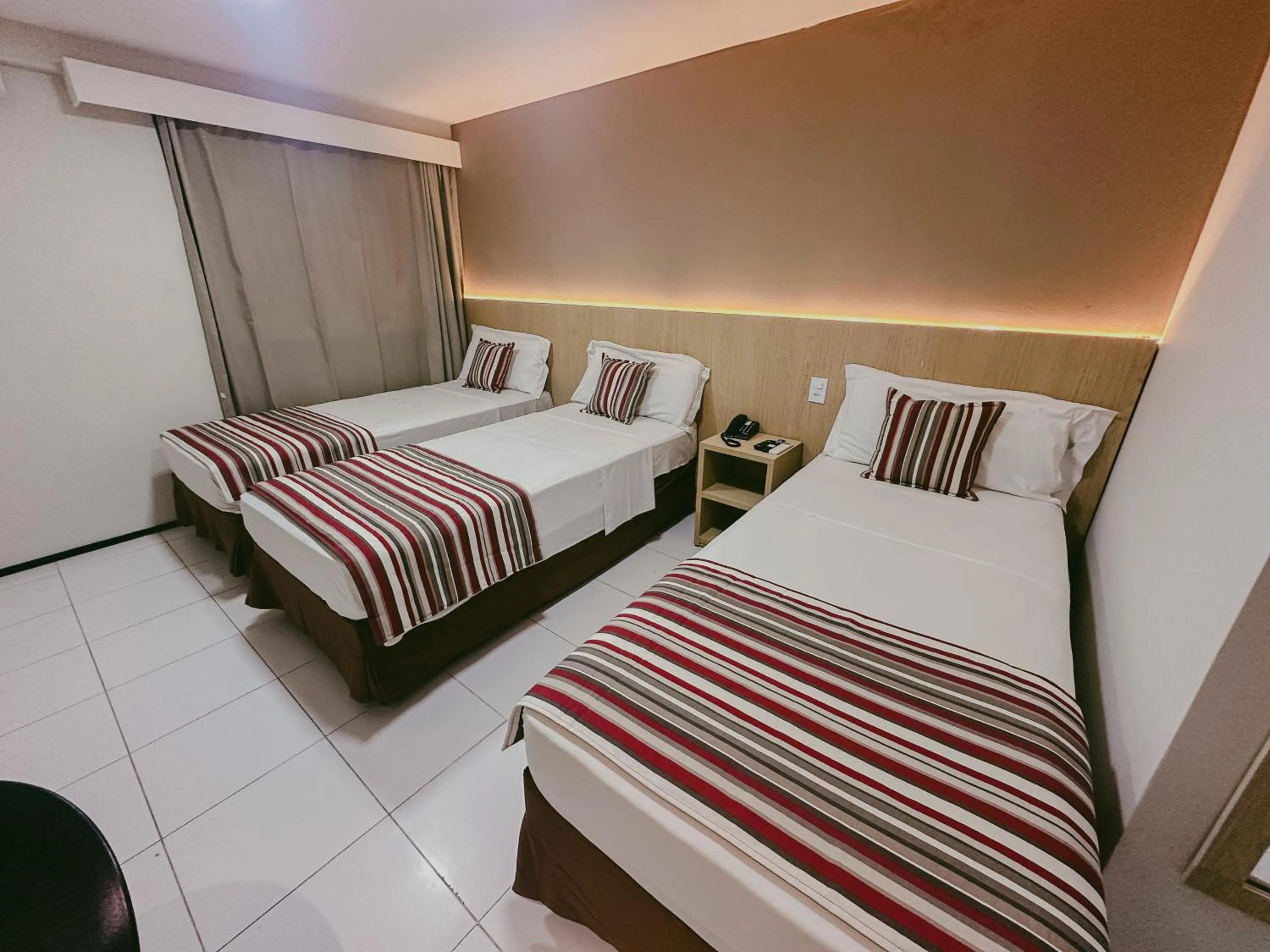 Bed in SLZ Lagoa Hotel