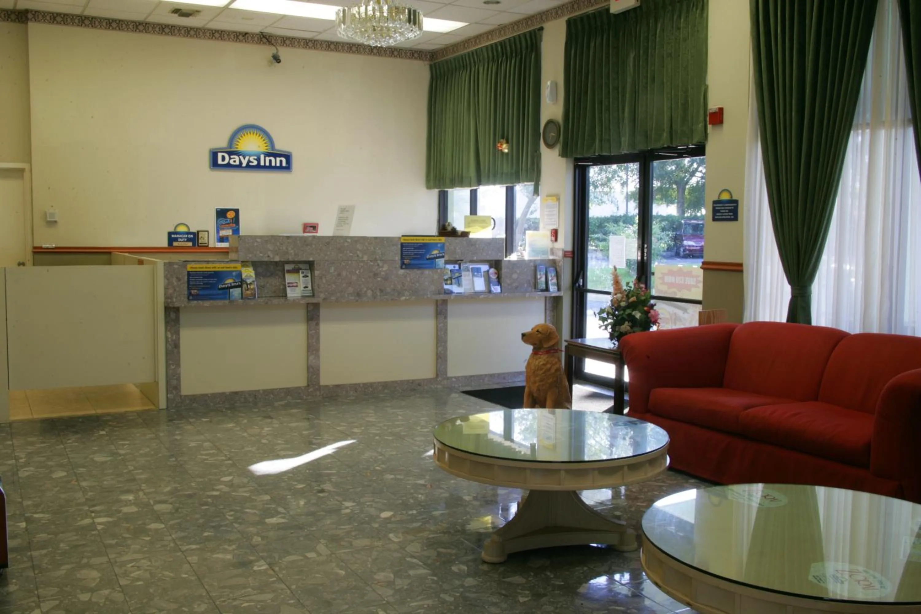 Lobby or reception in Days Inn by Wyndham N Orlando/Casselberry