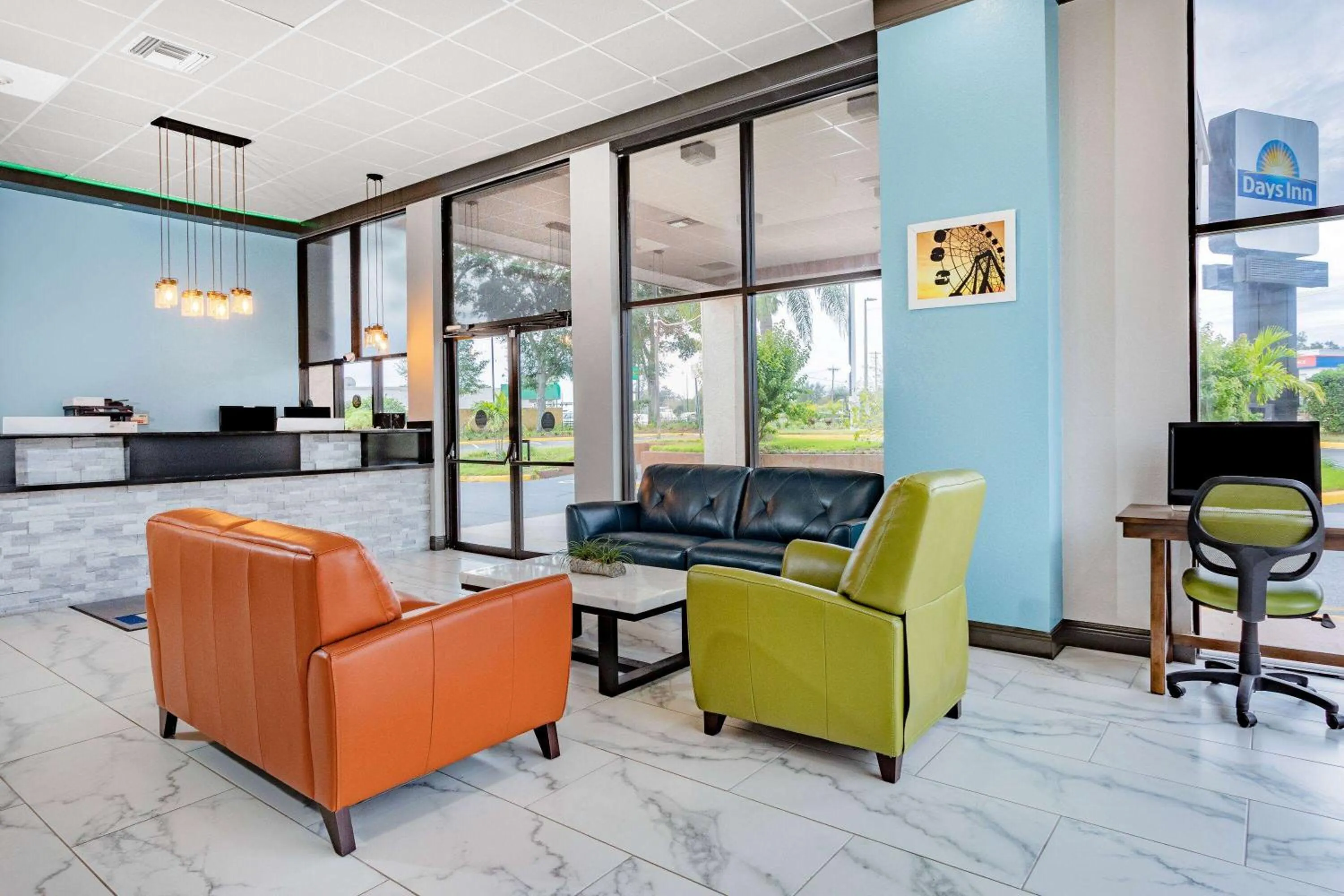 Lobby or reception in Days Inn by Wyndham N Orlando/Casselberry