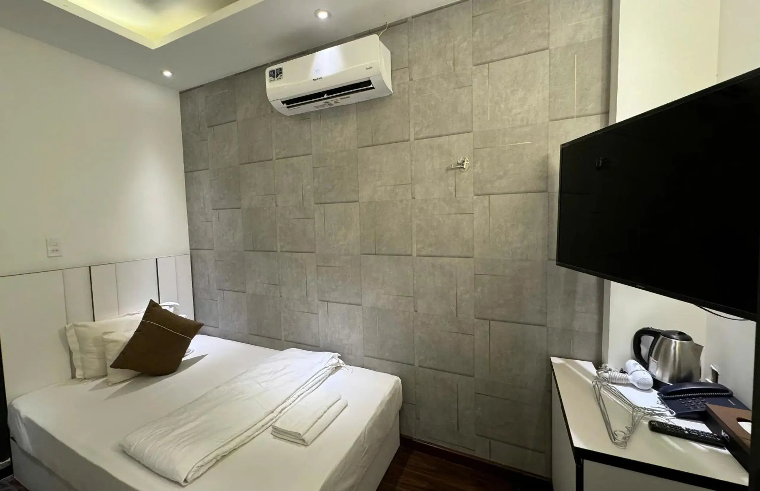 Bed in KP Hotel Bed in KP Hotel