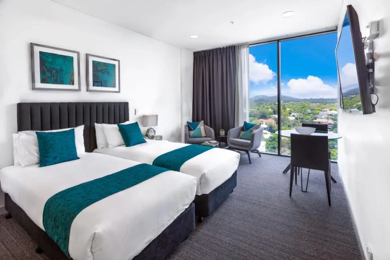 Property building, Bed in Essence Suites Taringa Property building, Bed in Essence Suites Taringa