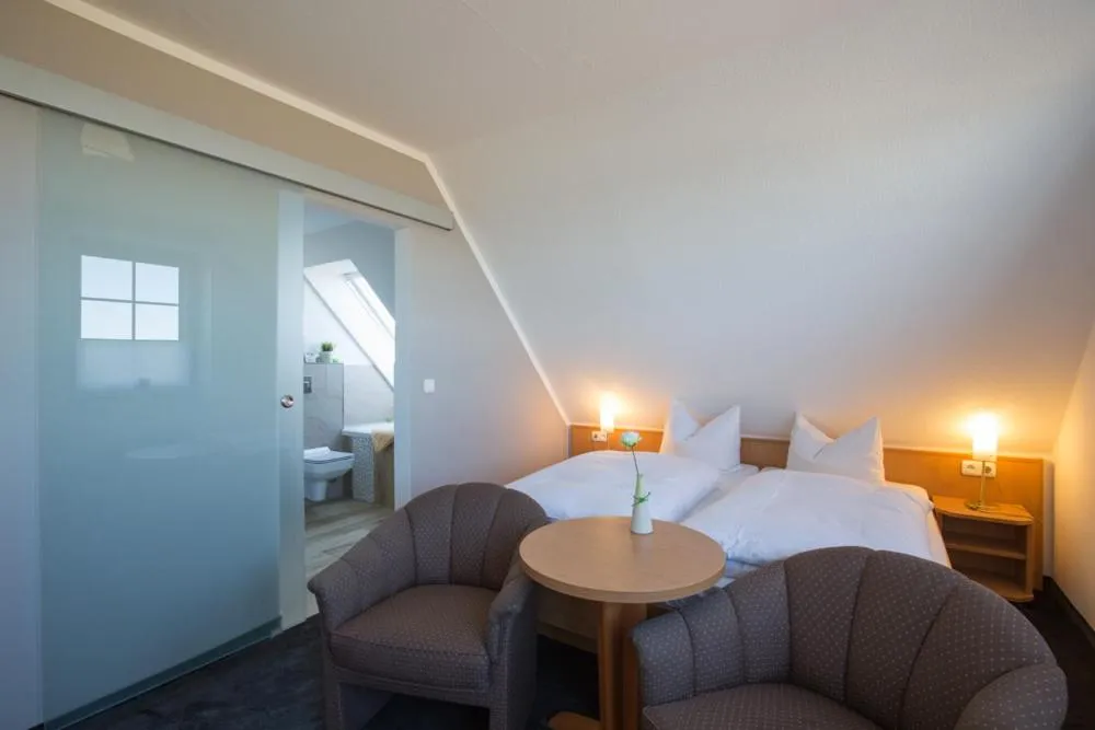 Photo of the whole room, Bed in Hotel Strandräuber