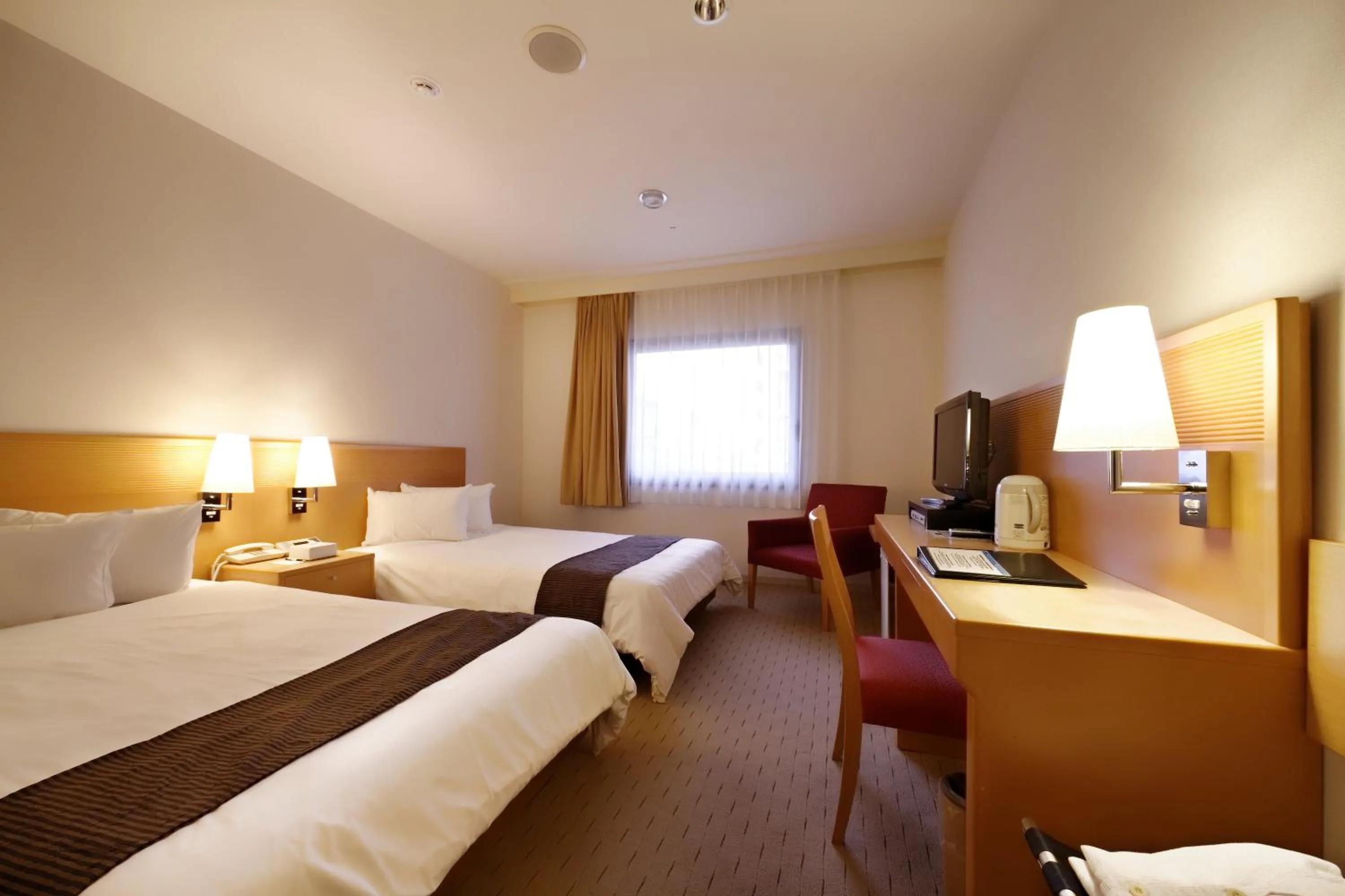 Photo of the whole room, Bed in Welco Narita