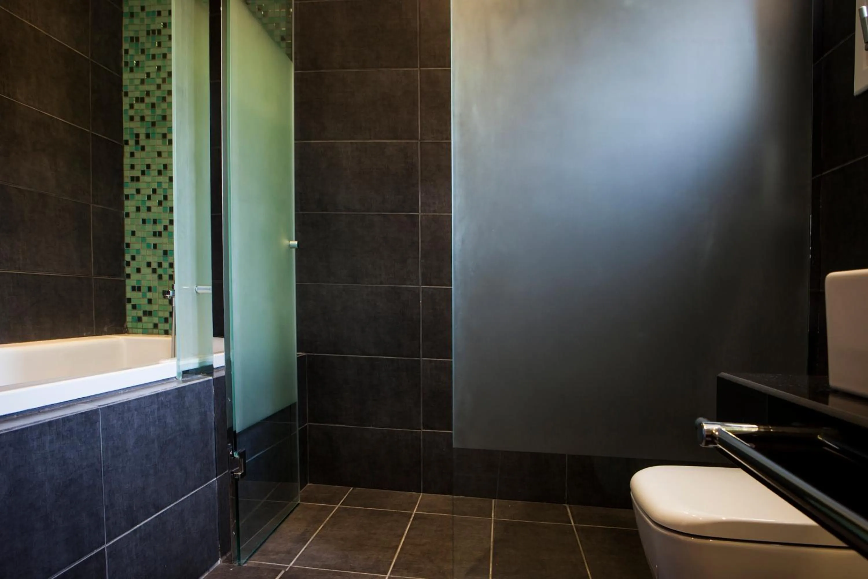 Bathroom in Dionysos Village Resort