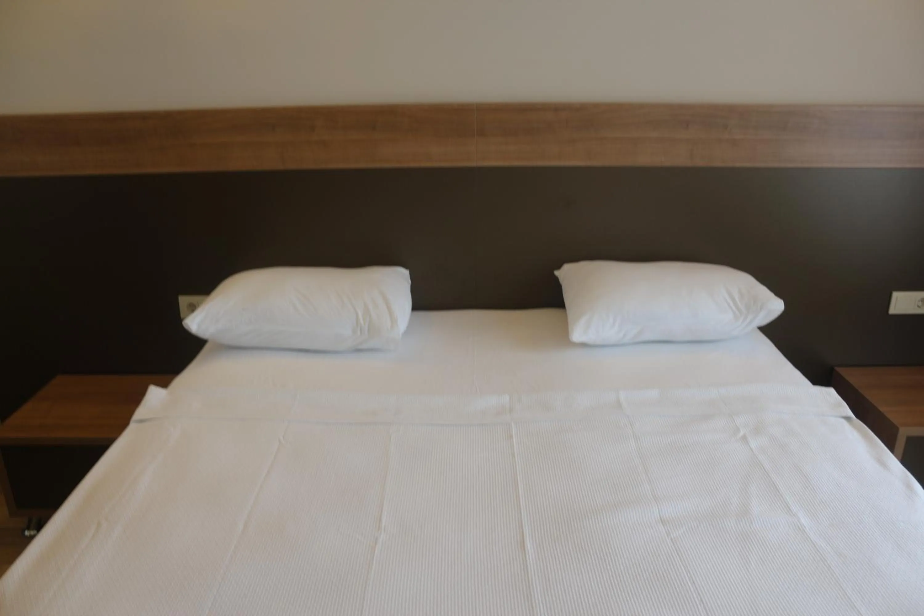 Bed in Longoz Hotel