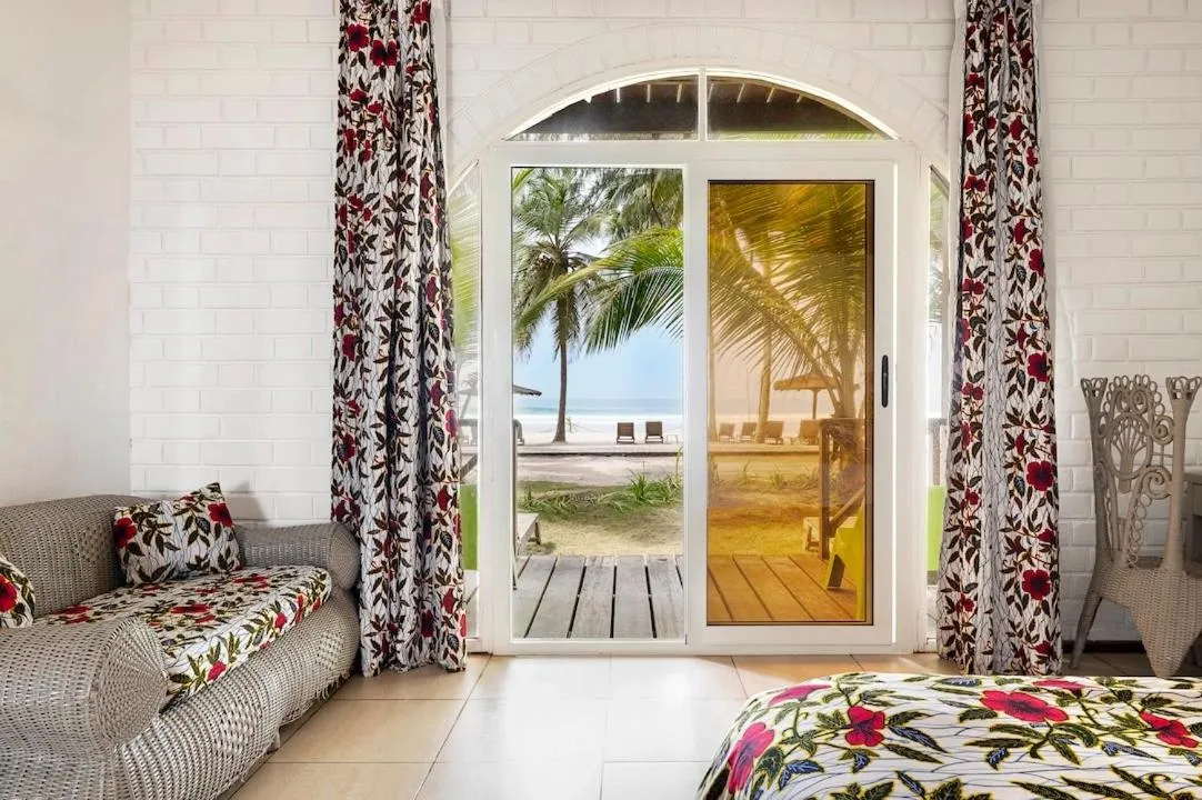 Seating area, Bed in Hotel Coucoue Lodge