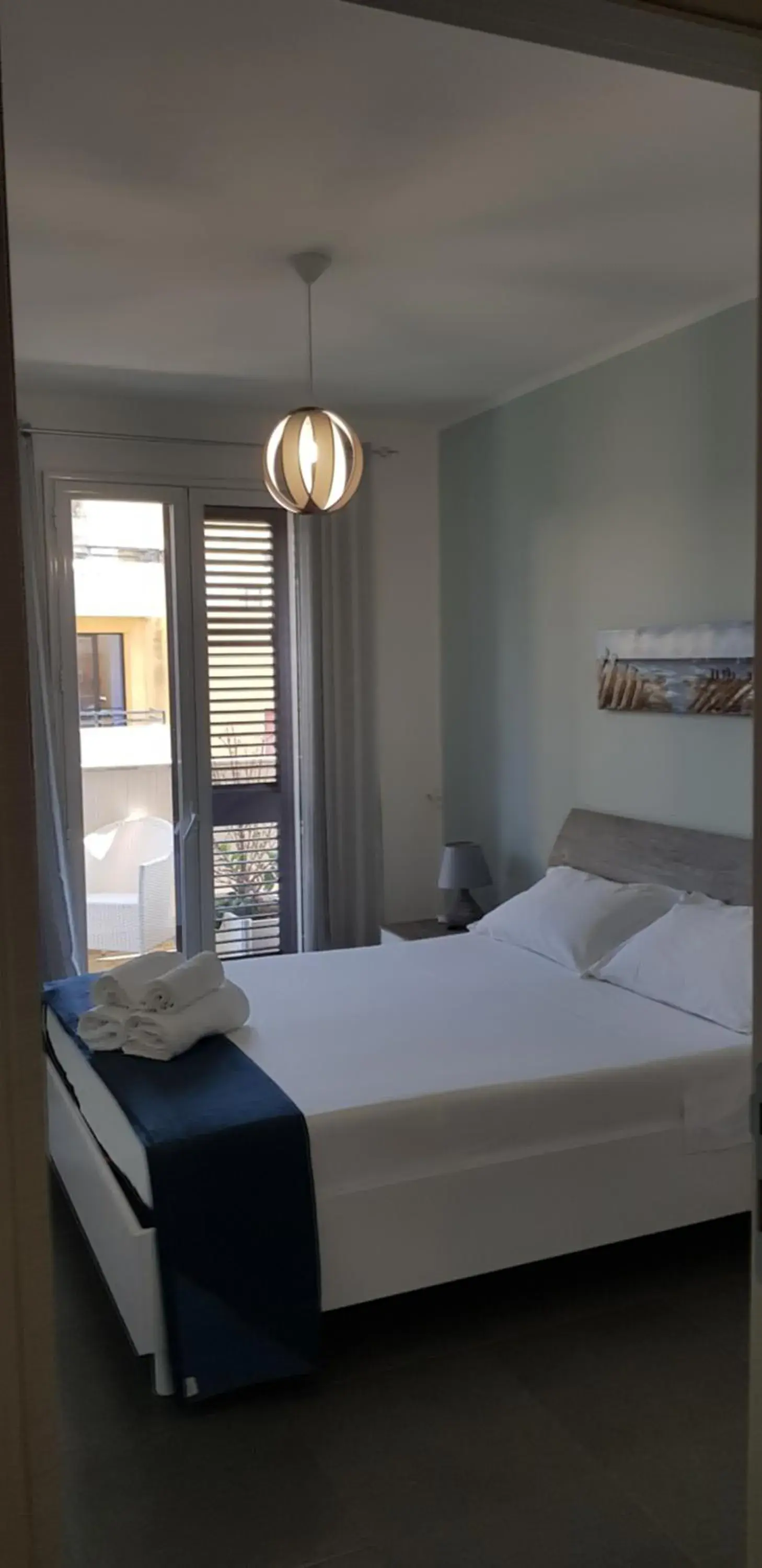 Two-Bedroom Apartment with Balcony and Sea View in B&B Al Porticciolo Two-Bedroom Apartment with Balcony and Sea View in B&B Al Porticciolo