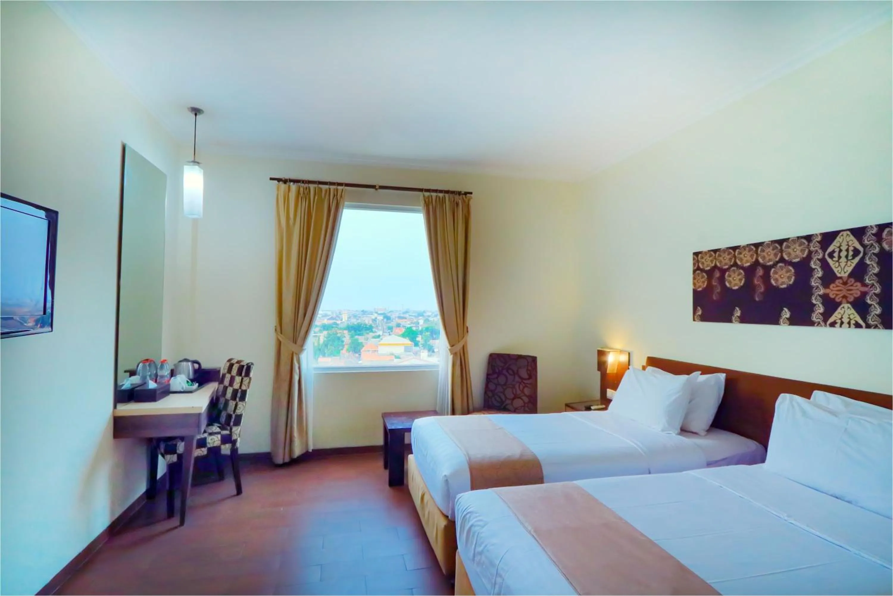 Bathroom, Bed in Hotel Dafam Pekalongan